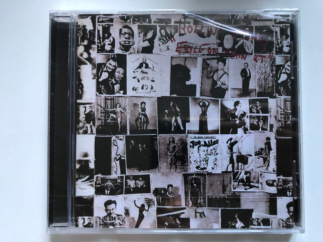 https://cdn10.bigcommerce.com/s-62bdpkt7pb/products/0/images/254507/The_Rolling_Stones_Exile_On_Main_St._Promotone_B._V._Audio_CD_2010_270_164-0_1__21326.1664206958.1280.1280.JPG?c=2&_gl=1*18trij9*_ga*MjA2NTIxMjE2MC4xNTkwNTEyNTMy*_ga_WS2VZYPC6G*MTY2NDIwMzQyMi41NjQuMS4xNjY0MjA2NzczLjMuMC4w