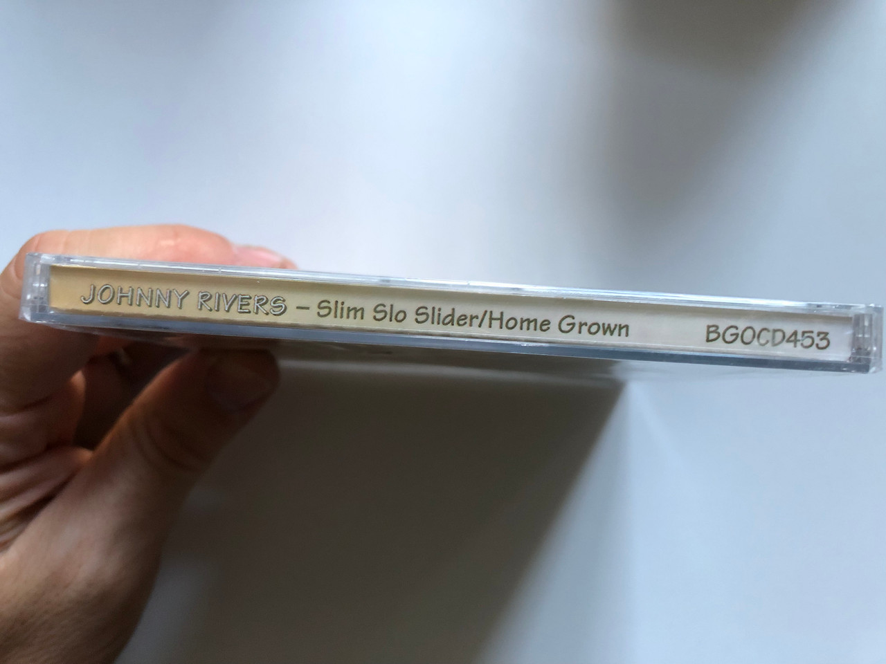 https://cdn10.bigcommerce.com/s-62bdpkt7pb/products/0/images/254520/Johnny_Rivers_Slim_Slo_Slider_Home_Grown_BGO_Records_2x_Audio_CD_1999_BGOCD453_3__12936.1664207521.1280.1280.JPG?c=2&_gl=1*9qnahx*_ga*MjA2NTIxMjE2MC4xNTkwNTEyNTMy*_ga_WS2VZYPC6G*MTY2NDIwMzQyMi41NjQuMS4xNjY0MjA3NTI2LjYwLjAuMA..