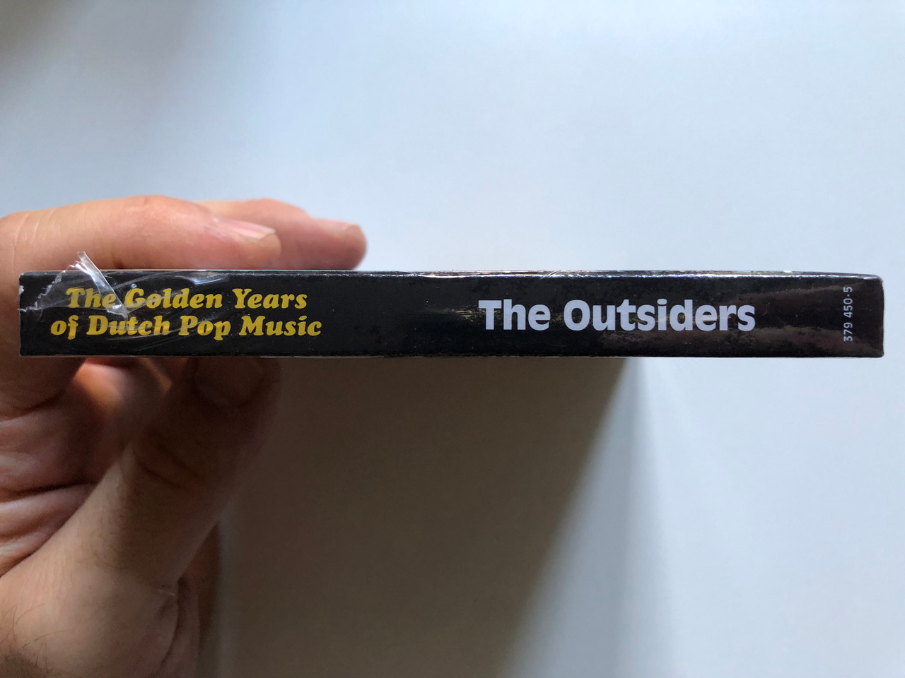 https://cdn10.bigcommerce.com/s-62bdpkt7pb/products/0/images/254556/The_Outsiders_The_Golden_Years_Of_Dutch_Pop_Music_AB_Sides_And_More_Universal_2x_Audio_CD_Stereo_2014_379_450-5_3__30861.1664213157.1280.1280.JPG?c=2&_gl=1*1fcn359*_ga*MjA2NTIxMjE2MC4xNTkwNTEyNTMy*_ga_WS2VZYPC6G*MTY2NDIxMTMzMS41NjUuMS4xNjY0MjEyOTIxLjM3LjAuMA..