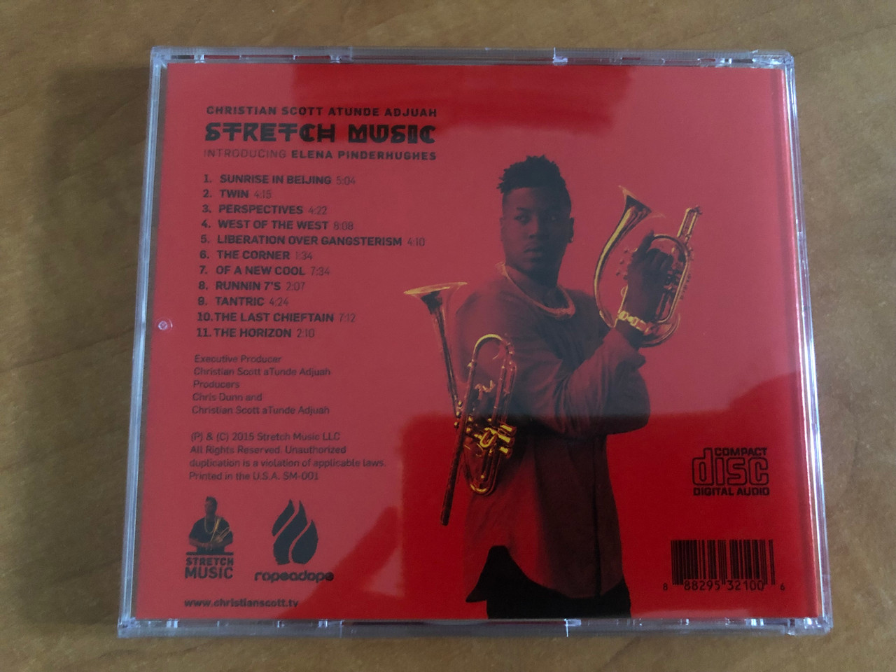 https://cdn10.bigcommerce.com/s-62bdpkt7pb/products/0/images/255061/Christian_Scott_aTunde_Adjuah_-Stretch_Music_Stretch_Music_Audio_CD_2015_SM-001_6__21951.1664449189.1280.1280.JPG?c=2&_gl=1*1istuic*_ga*MjA2NTIxMjE2MC4xNTkwNTEyNTMy*_ga_WS2VZYPC6G*MTY2NDQzNTUwNy41NzMuMS4xNjY0NDQ4MzYwLjQ0LjAuMA..
