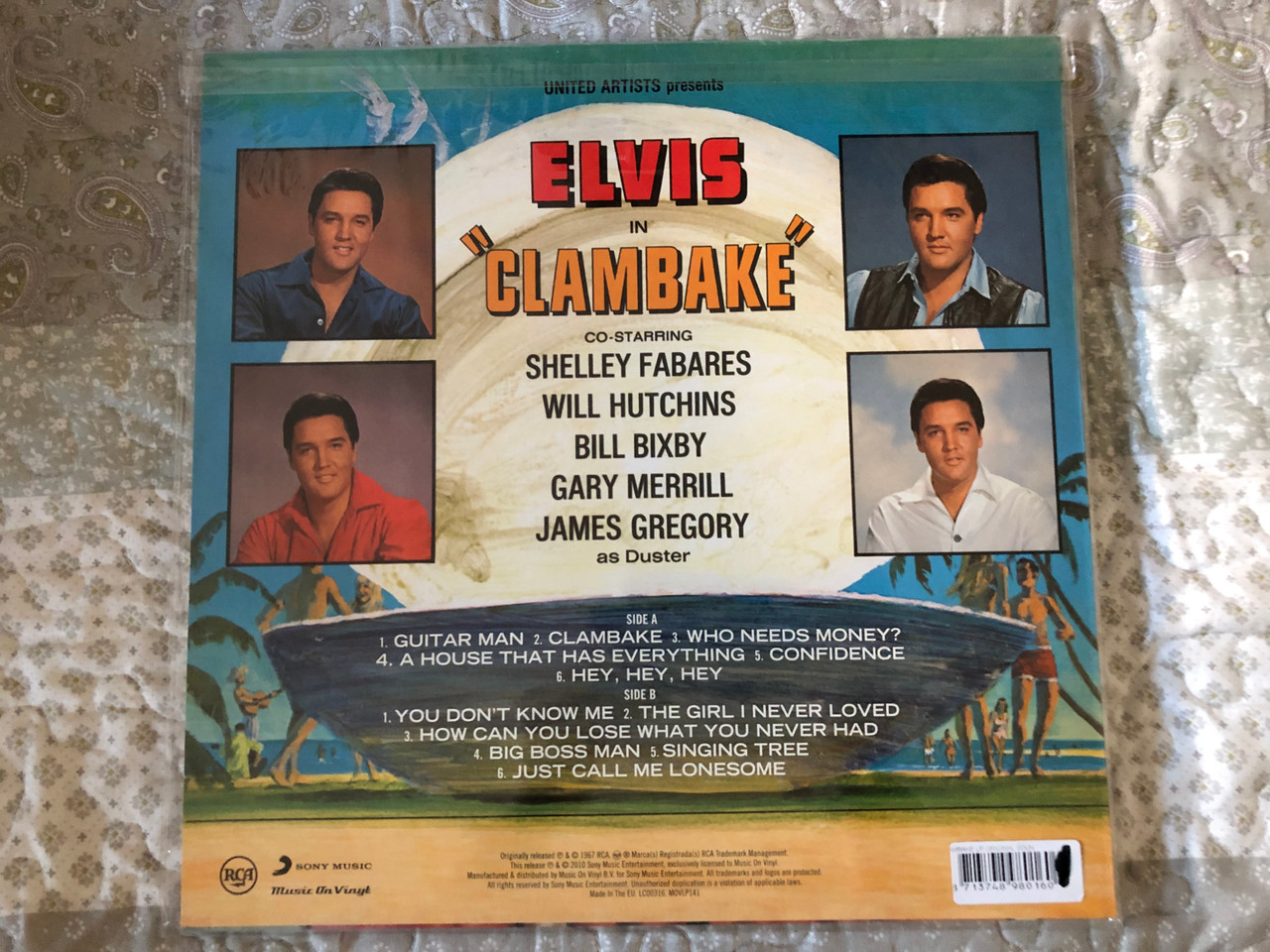 https://cdn10.bigcommerce.com/s-62bdpkt7pb/products/0/images/255397/RCA_Victor_Presents_-_Elvis_Clambake_In_The_Original_Soundtrack_Album_From_The_United_Artists_Picture_A_Levy-Gardner_-_Laven_Production_Music__42093.1664798726.1280.1280.JPG?c=2&_gl=1*1if9s1g*_ga*MjA2NTIxMjE2MC4xNTkwNTEyNTMy*_ga_WS2VZYPC6G*MTY2NDc4ODA5My41NzkuMS4xNjY0Nzk4NTAwLjU2LjAuMA..