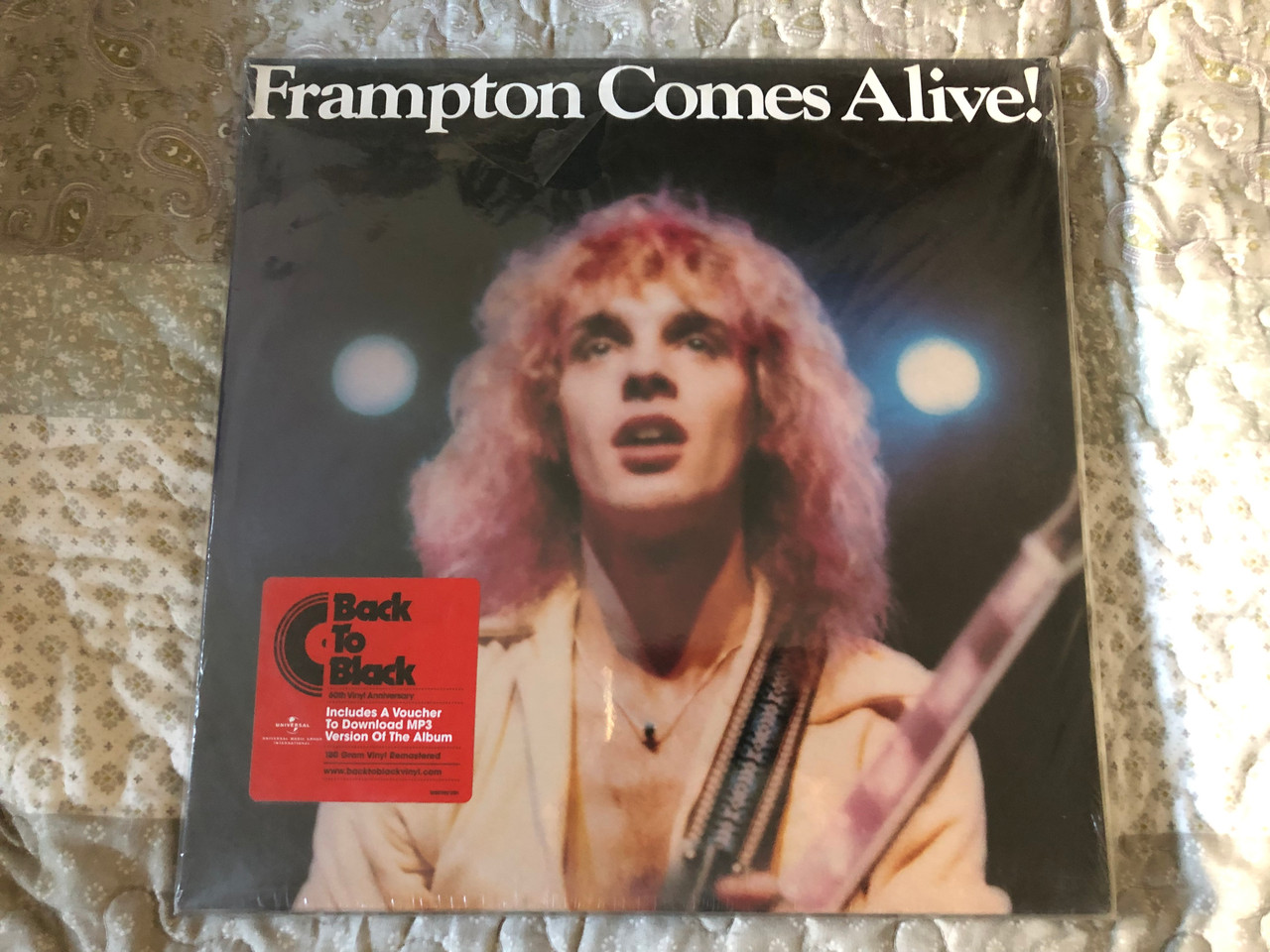 https://cdn10.bigcommerce.com/s-62bdpkt7pb/products/0/images/255487/Frampton_Comes_Alive_-_Peter_Frampton_AM_Records_2x_LP_SP-6505_1__52874.1664948337.1280.1280.JPG?c=2&_gl=1*28fzso*_ga*MjA2NTIxMjE2MC4xNTkwNTEyNTMy*_ga_WS2VZYPC6G*MTY2NDk0NjMxNC41ODEuMS4xNjY0OTQ4MTcyLjYwLjAuMA..