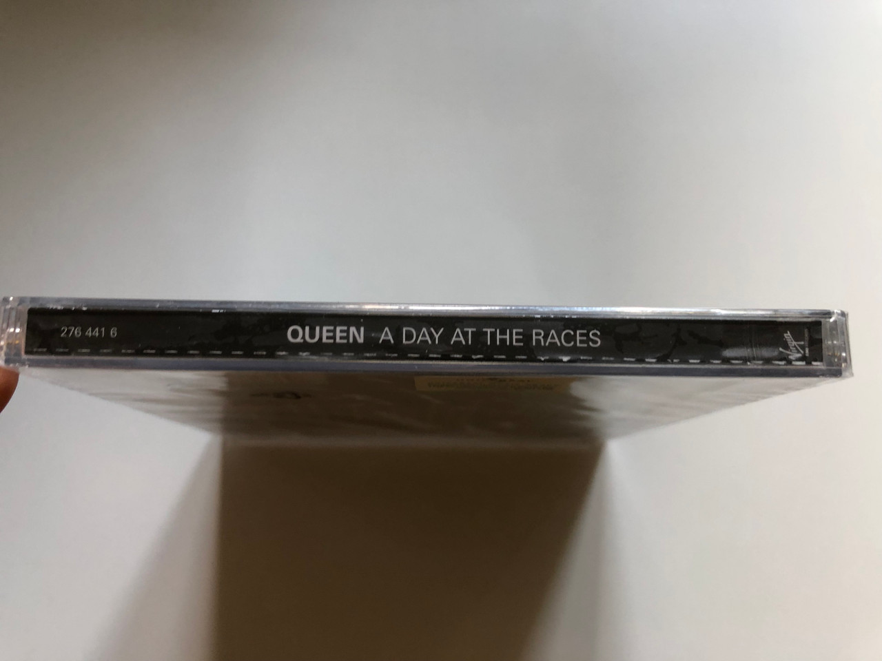 https://cdn10.bigcommerce.com/s-62bdpkt7pb/products/0/images/255549/Queen_A_Day_At_The_Races_Island_Records_Audio_CD_2011_276_441_6_3__39018.1664954578.1280.1280.JPG?c=2&_gl=1*miltk9*_ga*MjA2NTIxMjE2MC4xNTkwNTEyNTMy*_ga_WS2VZYPC6G*MTY2NDk0NjMxNC41ODEuMS4xNjY0OTU0NDY3LjQ1LjAuMA..