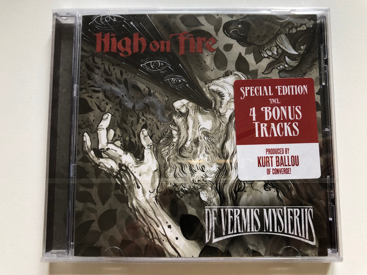 https://cdn10.bigcommerce.com/s-62bdpkt7pb/products/0/images/255589/High_On_Fire_De_Vermis_Mysteriis_Special_Edition_Incl._4_Bonus_Tracks._Produced_By_Kurt_Ballou_Of_Converge_Century_Media_Audio_CD_2012_9981052_1__93466.1665030852.1280.1280.JPG?c=2&_gl=1*1q71mbb*_ga*MjA2NTIxMjE2MC4xNTkwNTEyNTMy*_ga_WS2VZYPC6G*MTY2NTAyOTk3MC41ODQuMS4xNjY1MDMwNzAxLjQ3LjAuMA..
