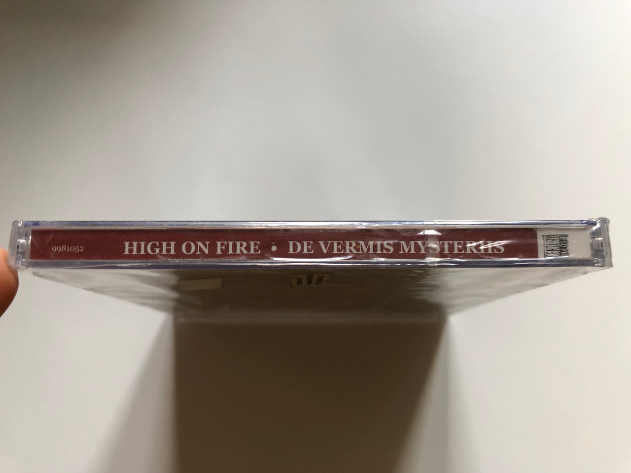 https://cdn10.bigcommerce.com/s-62bdpkt7pb/products/0/images/255591/High_On_Fire_De_Vermis_Mysteriis_Special_Edition_Incl._4_Bonus_Tracks._Produced_By_Kurt_Ballou_Of_Converge_Century_Media_Audio_CD_2012_9981052_3__49821.1665030881.1280.1280.JPG?c=2&_gl=1*1q71mbb*_ga*MjA2NTIxMjE2MC4xNTkwNTEyNTMy*_ga_WS2VZYPC6G*MTY2NTAyOTk3MC41ODQuMS4xNjY1MDMwNzAxLjQ3LjAuMA..