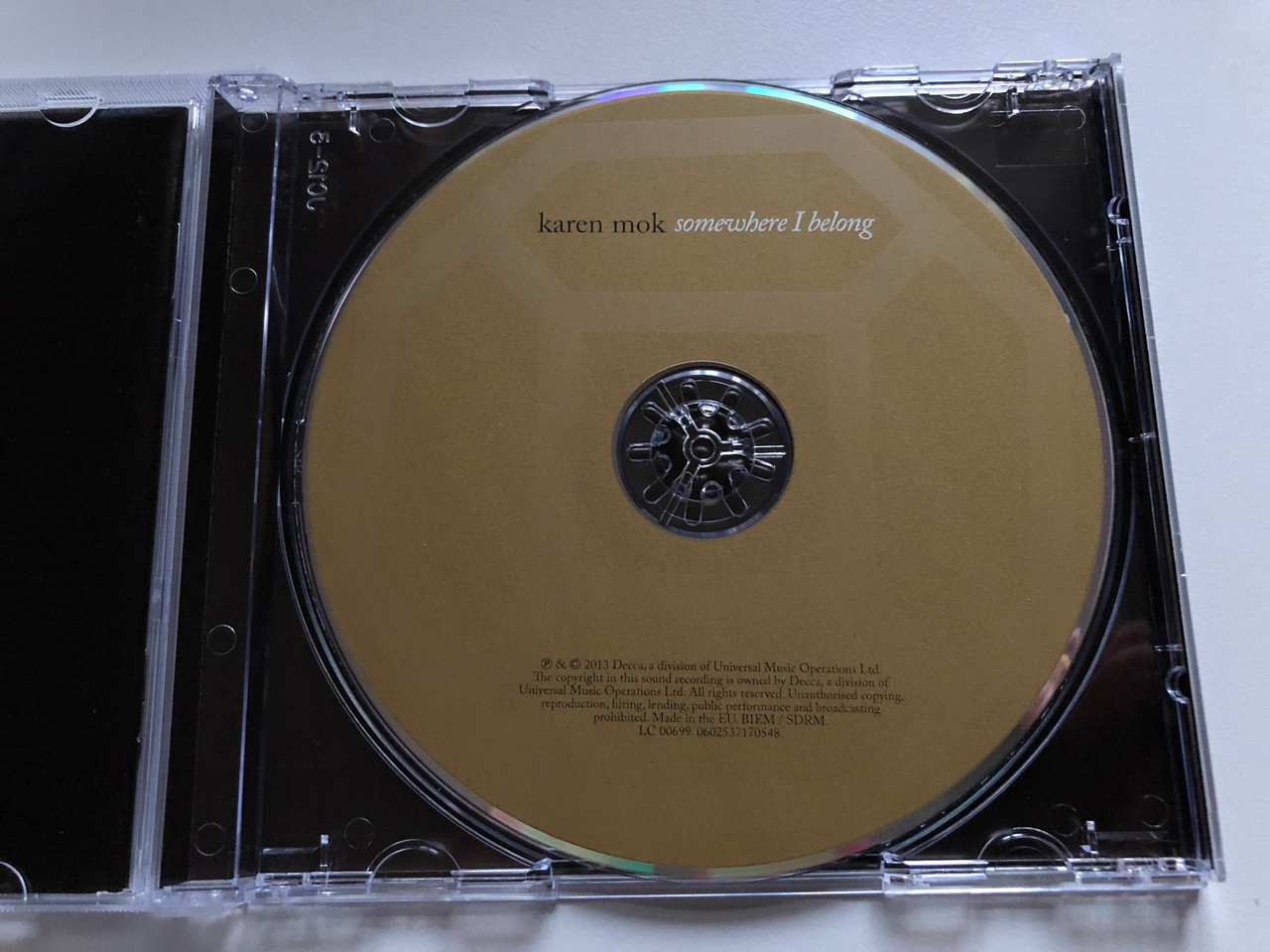 https://cdn10.bigcommerce.com/s-62bdpkt7pb/products/0/images/255685/Karen_Mok_Somewhere_I_Belong_Decca_Audio_CD_2013_0602537170548_3__60557.1665054320.1280.1280.JPG?c=2&_gl=1*43u3vy*_ga*MjA2NTIxMjE2MC4xNTkwNTEyNTMy*_ga_WS2VZYPC6G*MTY2NTA0NDUxMS41ODUuMS4xNjY1MDU0MTMxLjkuMC4w
