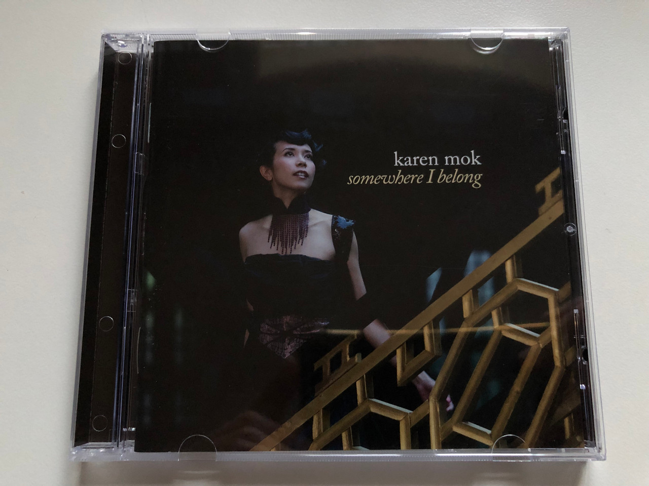https://cdn10.bigcommerce.com/s-62bdpkt7pb/products/0/images/255686/Karen_Mok_Somewhere_I_Belong_Decca_Audio_CD_2013_0602537170548_1__02819.1665054322.1280.1280.JPG?c=2&_gl=1*43u3vy*_ga*MjA2NTIxMjE2MC4xNTkwNTEyNTMy*_ga_WS2VZYPC6G*MTY2NTA0NDUxMS41ODUuMS4xNjY1MDU0MTMxLjkuMC4w