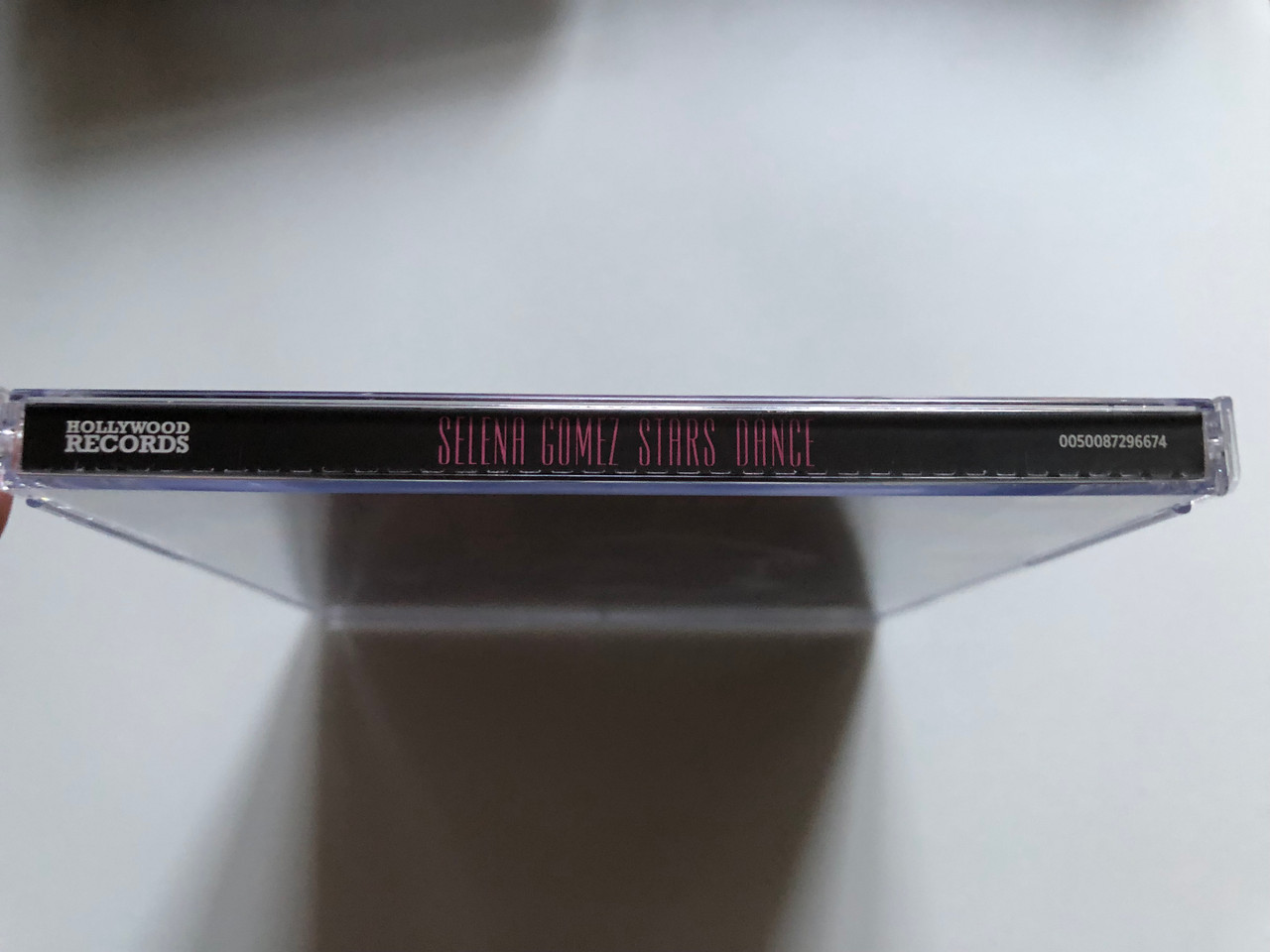https://cdn10.bigcommerce.com/s-62bdpkt7pb/products/0/images/255696/Selena_Gomez_Stars_Dance_Hollywood_Records_Audio_CD_2013_0050087296674_3__85394.1665121457.1280.1280.JPG?c=2&_gl=1*11w10rt*_ga*MjA2NTIxMjE2MC4xNTkwNTEyNTMy*_ga_WS2VZYPC6G*MTY2NTEyMDY0My41ODYuMS4xNjY1MTIxMzMzLjU3LjAuMA..