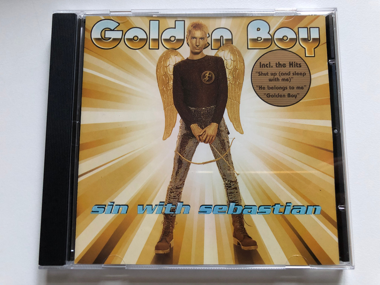 https://cdn10.bigcommerce.com/s-62bdpkt7pb/products/0/images/255703/Sin_With_Sebastian_Golden_Boy_Incl._the_Hits_Shut_Up_And_Sleep_With_Me_He_Belongs_To_Me_Golden_Boy_Sing_Sing_Audio_CD_1995_74321_31854_2_1__16148.1665122952.1280.1280.JPG?c=2&_gl=1*ksc744*_ga*MjA2NTIxMjE2MC4xNTkwNTEyNTMy*_ga_WS2VZYPC6G*MTY2NTEyMDY0My41ODYuMS4xNjY1MTIyODE3LjQyLjAuMA..
