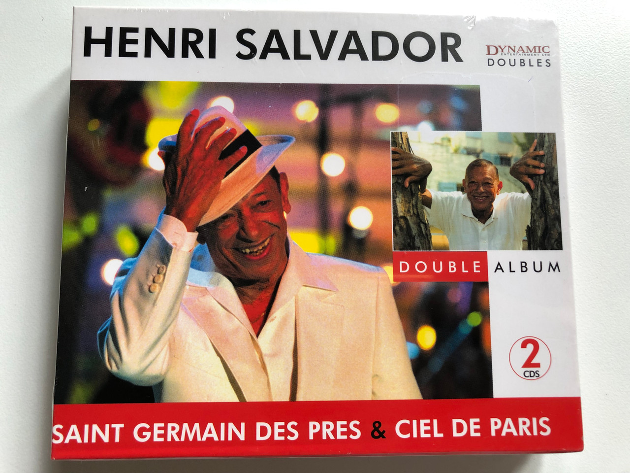 https://cdn10.bigcommerce.com/s-62bdpkt7pb/products/0/images/255931/Henri_Salvador_Saint_Germain_Des_Pres_Ciel_De_Paris_Double_Album_Dynamic_Doubles_2x_Audio_CD_2005_DYN_4035_1__92111.1665503376.1280.1280.JPG?c=2&_gl=1*1d908en*_ga*MjA2NTIxMjE2MC4xNTkwNTEyNTMy*_ga_WS2VZYPC6G*MTY2NTQ5NDYwOS41ODkuMS4xNjY1NTAzMzQ2LjYwLjAuMA..