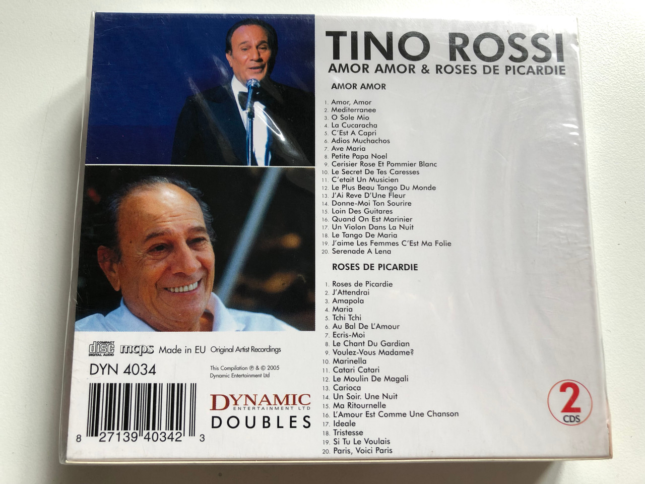 https://cdn10.bigcommerce.com/s-62bdpkt7pb/products/0/images/255938/Tino_Rossi_-_Amor_Amor_Roses_De_Picardie_Double_Album_Dynamic_Entertainment_Ltd_2x_Audio_CD_2005_DYN_4034_2__99204.1665504558.1280.1280.JPG?c=2&_gl=1*1v8qt1l*_ga*MjA2NTIxMjE2MC4xNTkwNTEyNTMy*_ga_WS2VZYPC6G*MTY2NTQ5NDYwOS41ODkuMS4xNjY1NTA0NDU1LjYwLjAuMA..