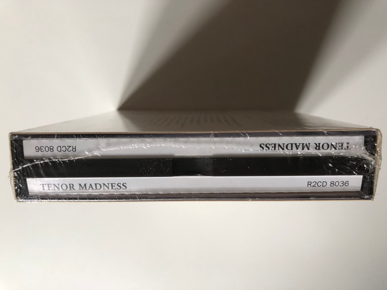 https://cdn10.bigcommerce.com/s-62bdpkt7pb/products/0/images/255943/Tenor_Madness_-_A_Tenor_Sax_Anthology_Cabu_Masters_Of_Jazz_2x_Audio_CD_2002_R2CD_8036_4__90321.1665505100.1280.1280.JPG?c=2&_gl=1*1llbbym*_ga*MjA2NTIxMjE2MC4xNTkwNTEyNTMy*_ga_WS2VZYPC6G*MTY2NTQ5NDYwOS41ODkuMS4xNjY1NTA1MDQ1LjYwLjAuMA..