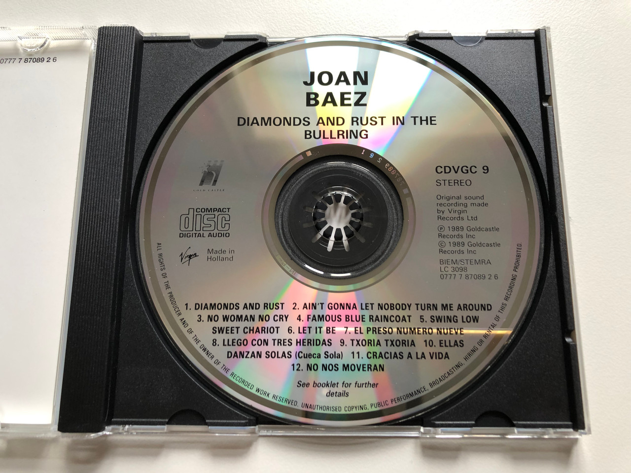 https://cdn10.bigcommerce.com/s-62bdpkt7pb/products/0/images/255962/Joan_Baez_Diamonds_And_Rust_In_The_Bullring_Gold_Castle_Audio_CD_1989_Stereo_CDVGC9_3__19727.1665506838.1280.1280.JPG?c=2&_gl=1*8mws3k*_ga*MjA2NTIxMjE2MC4xNTkwNTEyNTMy*_ga_WS2VZYPC6G*MTY2NTQ5NDYwOS41ODkuMS4xNjY1NTA2NzIyLjUxLjAuMA..