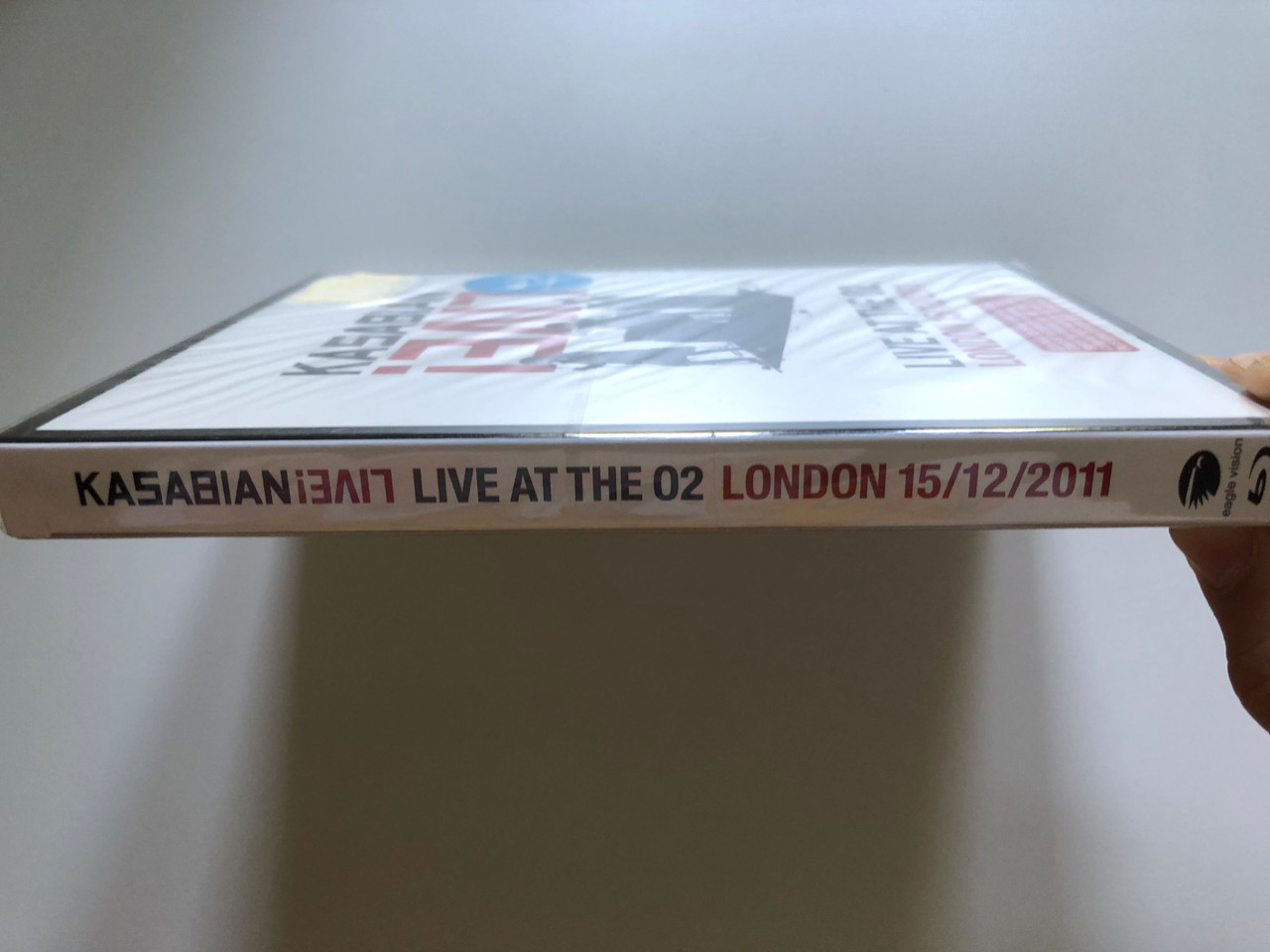 https://cdn10.bigcommerce.com/s-62bdpkt7pb/products/0/images/256202/Kasabian_Live_Live_At_The_O2_London_15122011_Contains_CD_Of_Highlights_From_The_Concert_Includes_Fire_Empire_L._S._F._Shoot_The_Runner_Days_Are_Forgotten_Clubfoot_Eagle_Vision_Au_3__98585.1665658543.1280.1280.JPG?c=2&_gl=1*1ec24zm*_ga*MjA2NTIxMjE2MC4xNTkwNTEyNTMy*_ga_WS2VZYPC6G*MTY2NTY0ODE2NC41OTEuMS4xNjY1NjU4MzAyLjI4LjAuMA..