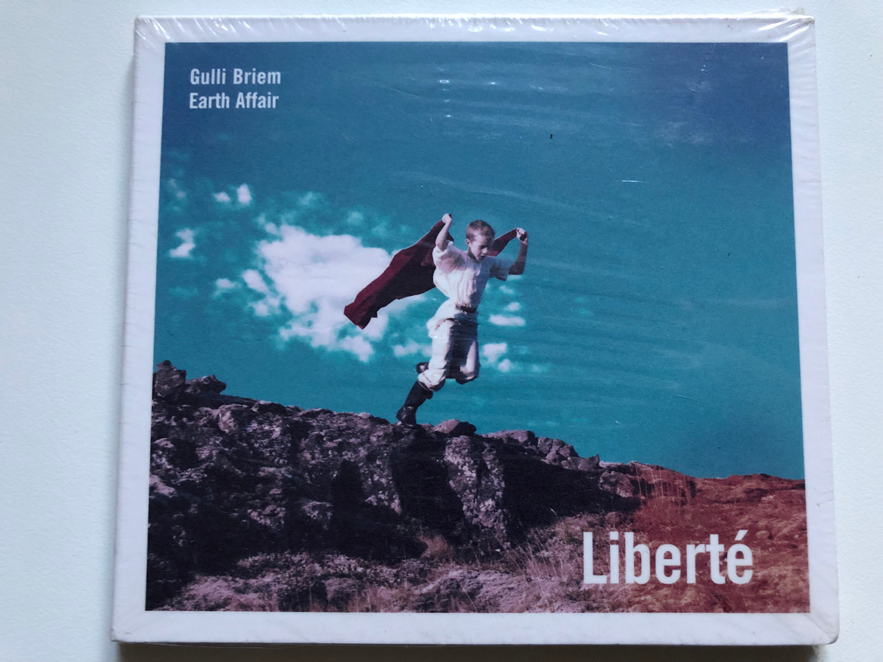 https://cdn10.bigcommerce.com/s-62bdpkt7pb/products/0/images/256706/Gulli_Briem_Earth_Affair_Libert_Gramy_Records_Audio_CD_2014_GR-114_1__97618.1666244956.1280.1280.JPG?c=2&_gl=1*h8566a*_ga*MjA2NTIxMjE2MC4xNTkwNTEyNTMy*_ga_WS2VZYPC6G*MTY2NjIzOTAxOS41OTkuMS4xNjY2MjQ0OTYwLjYwLjAuMA..