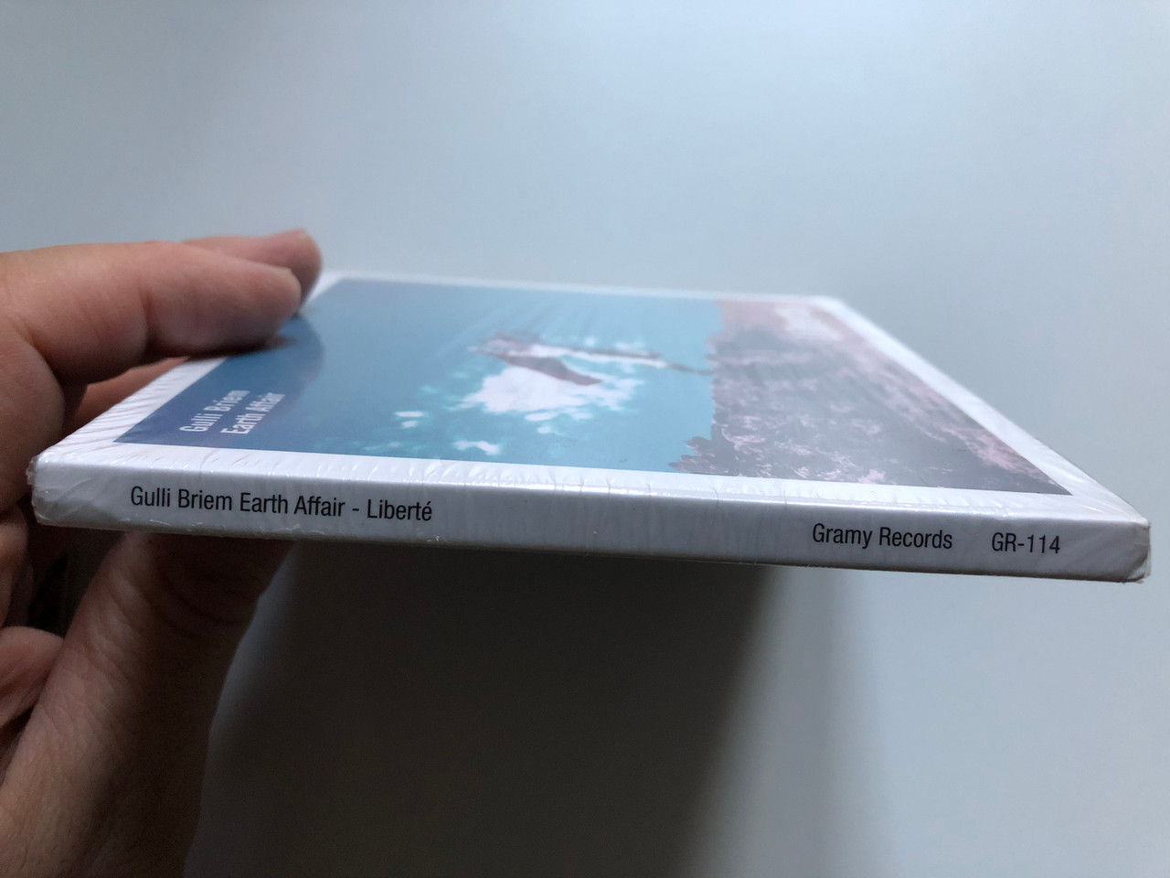 https://cdn10.bigcommerce.com/s-62bdpkt7pb/products/0/images/256708/Gulli_Briem_Earth_Affair_Libert_Gramy_Records_Audio_CD_2014_GR-114_3__91213.1666244975.1280.1280.JPG?c=2&_gl=1*h8566a*_ga*MjA2NTIxMjE2MC4xNTkwNTEyNTMy*_ga_WS2VZYPC6G*MTY2NjIzOTAxOS41OTkuMS4xNjY2MjQ0OTYwLjYwLjAuMA..