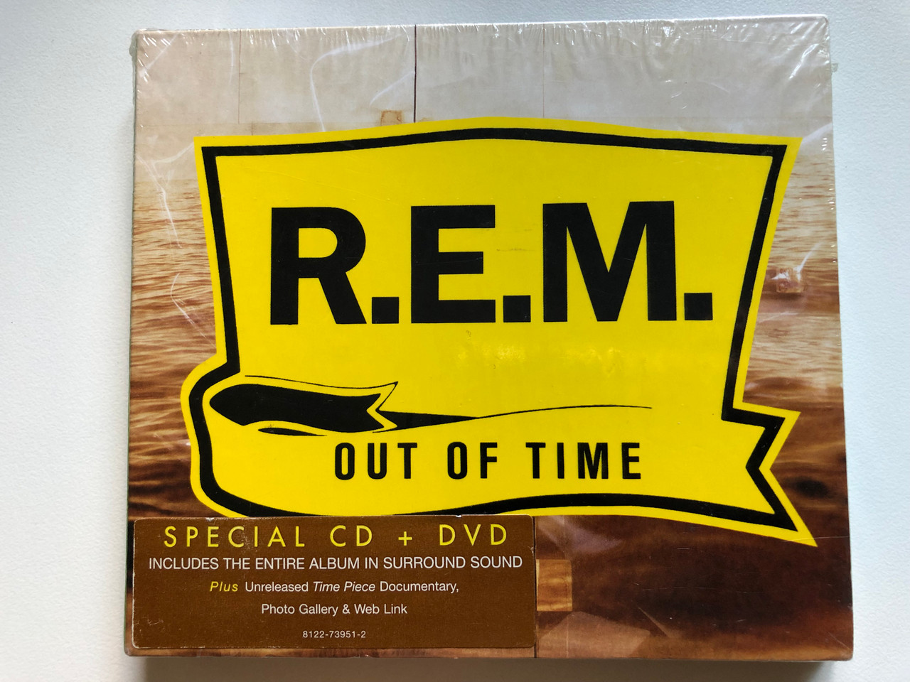 https://cdn10.bigcommerce.com/s-62bdpkt7pb/products/0/images/256841/R.E.M._Out_Of_Time_Special_CD_DVD_Includes_The_Entire_Album_In_Surround_Sound._Plus_Unreleased_Tine_Piece_Documentary_Photo_Gallery_Web_Link_Warner_Bros._Records_Audio_CD_DVD_2005_1__20435.1666358201.1280.1280.JPG?c=2&_gl=1*1v4guta*_ga*MjA2NTIxMjE2MC4xNTkwNTEyNTMy*_ga_WS2VZYPC6G*MTY2NjM1NjQ5NS42MDIuMS4xNjY2MzU3OTgyLjQwLjAuMA..