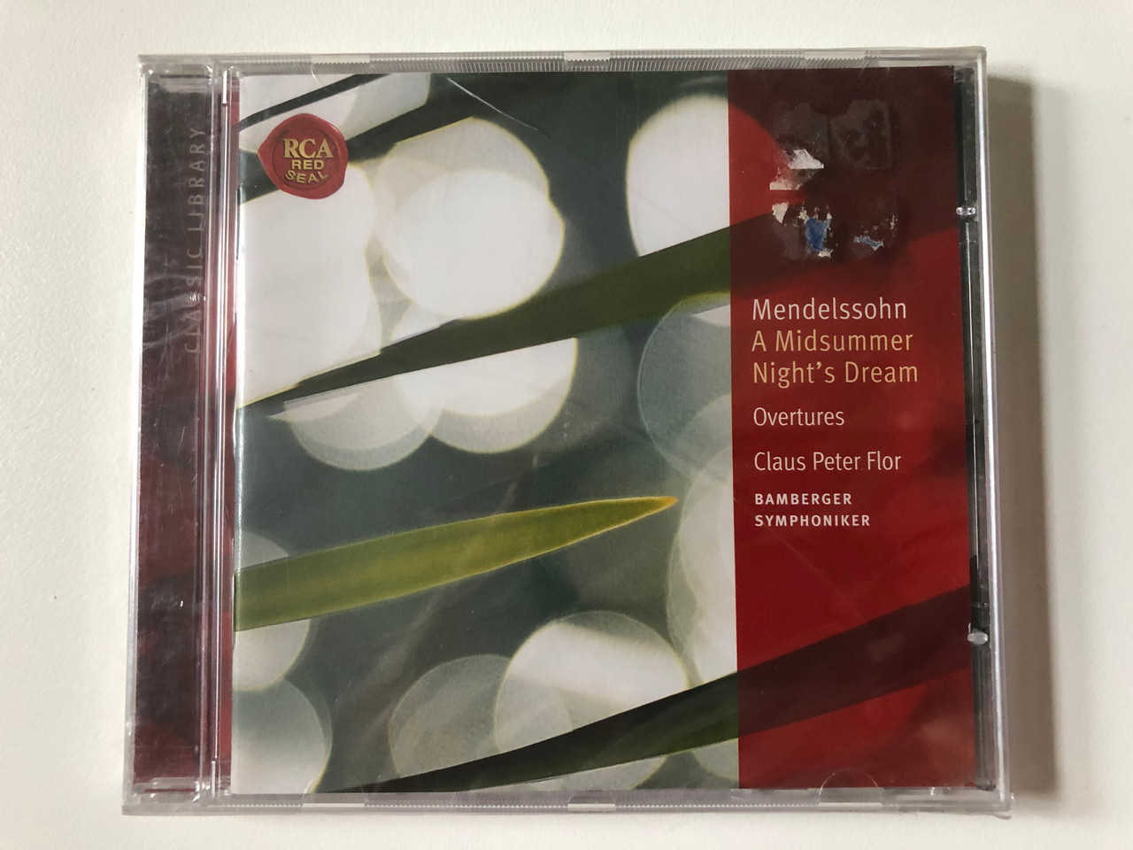 https://cdn10.bigcommerce.com/s-62bdpkt7pb/products/0/images/256960/Mendelssohn_-_A_Midsummer_Nights_Dream_Overtures_Claus_Peter_Flor_Bamberger_Symphoniker_RCA_Red_Seal_Audio_CD_2004_82876_60864_2_1__61589.1666795500.1280.1280.JPG?c=2&_gl=1*174dgql*_ga*MjA2NTIxMjE2MC4xNTkwNTEyNTMy*_ga_WS2VZYPC6G*MTY2Njc5NDA3MC42MDQuMS4xNjY2Nzk1MDI1LjMzLjAuMA..