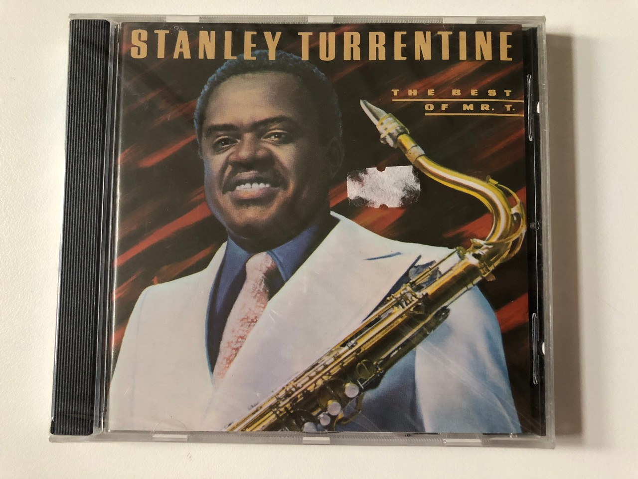 https://cdn10.bigcommerce.com/s-62bdpkt7pb/products/0/images/256990/Stanley_Turrentine_The_Best_Of_Mr._T_Fantasy_Audio_CD_2006_00025218770828_1__31672.1666800253.1280.1280.JPG?c=2&_gl=1*18y6pc2*_ga*MjA2NTIxMjE2MC4xNTkwNTEyNTMy*_ga_WS2VZYPC6G*MTY2Njc5NDA3MC42MDQuMS4xNjY2ODAwMTc3LjM2LjAuMA..