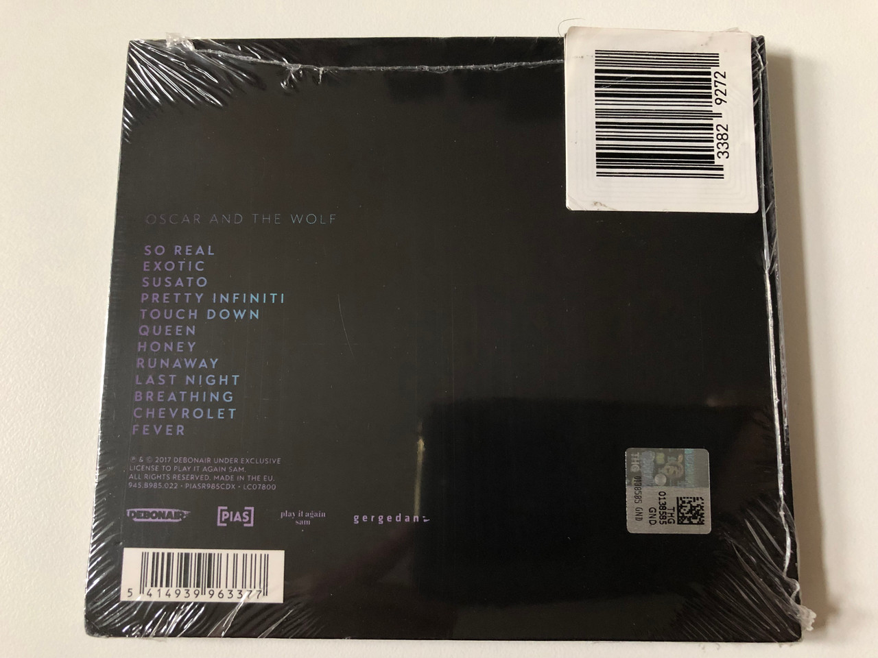 https://cdn10.bigcommerce.com/s-62bdpkt7pb/products/0/images/257173/Oscar_And_The_Wolf_New_Album_Infinity_Feat._The_Singles_So_Real_Breathing_Fever_Debonair_Audio_CD_2017_PIASR985CDX_2__39794.1666969095.1280.1280.JPG?c=2&_gl=1*1a2qufq*_ga*MjA2NTIxMjE2MC4xNTkwNTEyNTMy*_ga_WS2VZYPC6G*MTY2Njk2MjE1OC42MDcuMS4xNjY2OTY4OTI2LjE4LjAuMA..