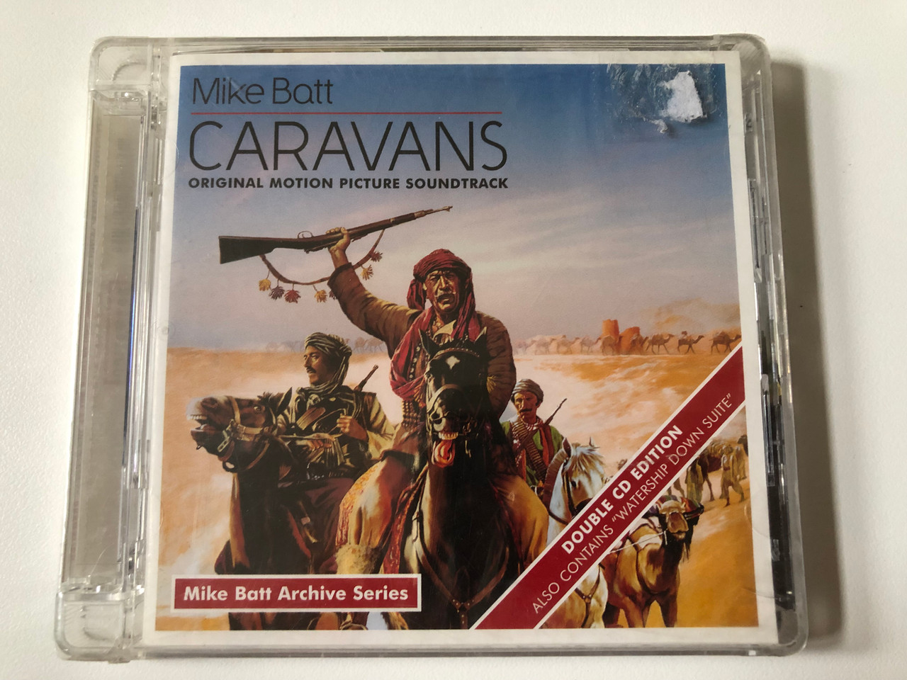 https://cdn10.bigcommerce.com/s-62bdpkt7pb/products/0/images/257249/Mike_Batt_-_Caravans_Original_Motion_Picture_Soundtracks_Mike_Batt_Archive_Series_Double_CD_Edition_Also_Contains_Watership_Down_Suite_Dramatico_2x_Audio_CD_2010_DRAMCD0056_1__62438.1667206030.1280.1280.JPG?c=2&_gl=1*2ualre*_ga*MjA2NTIxMjE2MC4xNTkwNTEyNTMy*_ga_WS2VZYPC6G*MTY2NzIwMjA2OC42MDkuMS4xNjY3MjA1NjU3LjQwLjAuMA..