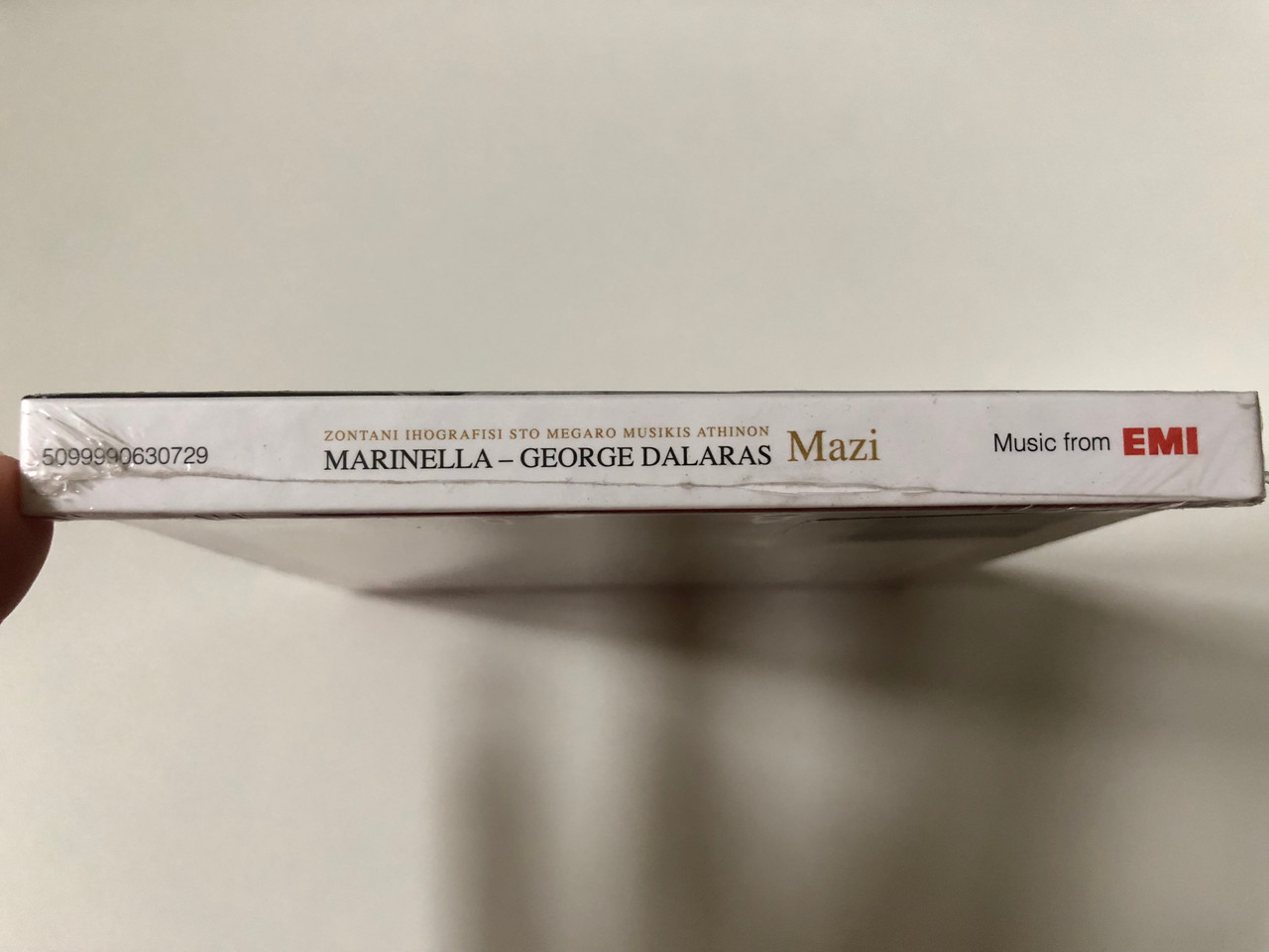 https://cdn10.bigcommerce.com/s-62bdpkt7pb/products/0/images/257365/Zontani_Ihografisi_Sto_Megaro_Musikis_Athinon_-_Marinella-George_Dalaras_Mazi_EMI_Audio_CD_2010_5099990630729_3__97740.1667285909.1280.1280.JPG?c=2&_gl=1*5esfpk*_ga*MjA2NTIxMjE2MC4xNTkwNTEyNTMy*_ga_WS2VZYPC6G*MTY2NzI4NTYzMC42MTEuMC4xNjY3Mjg1NjMwLjYwLjAuMA..