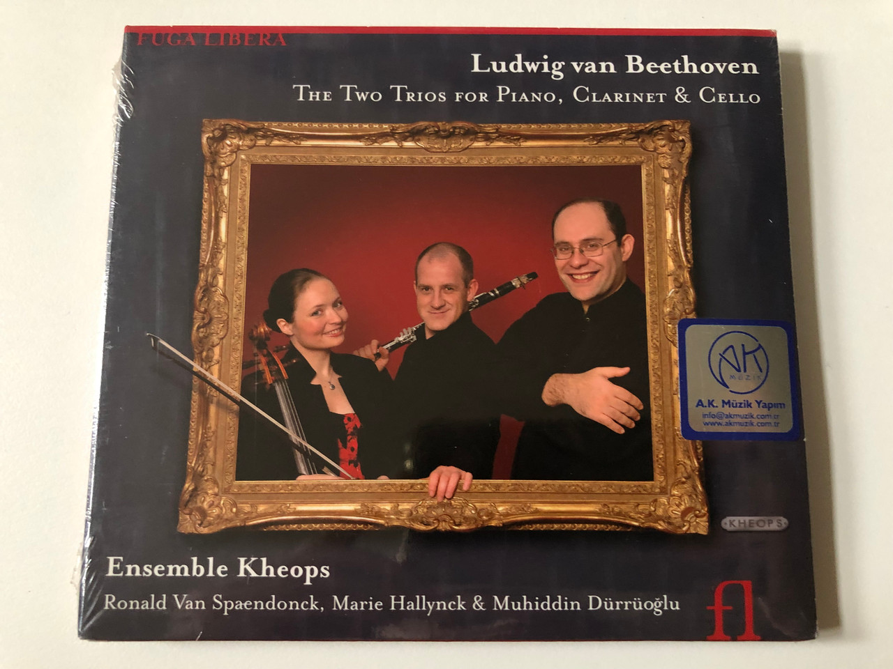 https://cdn10.bigcommerce.com/s-62bdpkt7pb/products/0/images/257402/Ludwig_van_Beethoven_-_The_Two_Trios_For_Piano_Clarinet_Cello_-_Ensemble_Kheops_Ronald_Van_Spaendonck_Marie_Hallynck_Muhiddin_Durruoglu_Fuga_Libera_Audio_CD_2008_FUG535_1__13814.1667292425.1280.1280.JPG?c=2&_gl=1*1r7buks*_ga*MjA2NTIxMjE2MC4xNTkwNTEyNTMy*_ga_WS2VZYPC6G*MTY2NzI4NTYzMC42MTEuMS4xNjY3MjkyMTU1LjQ1LjAuMA..