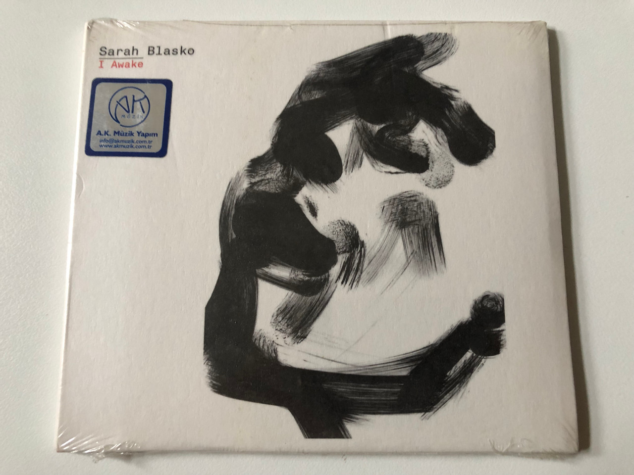 https://cdn10.bigcommerce.com/s-62bdpkt7pb/products/0/images/257414/Sarah_Blasko_I_Awake_Dramatico_Audio_CD_2013_DRAMCD0090_1__59678.1667294793.1280.1280.JPG?c=2&_gl=1*tcb5w4*_ga*MjA2NTIxMjE2MC4xNTkwNTEyNTMy*_ga_WS2VZYPC6G*MTY2NzI4NTYzMC42MTEuMS4xNjY3Mjk0ODA2LjYwLjAuMA..