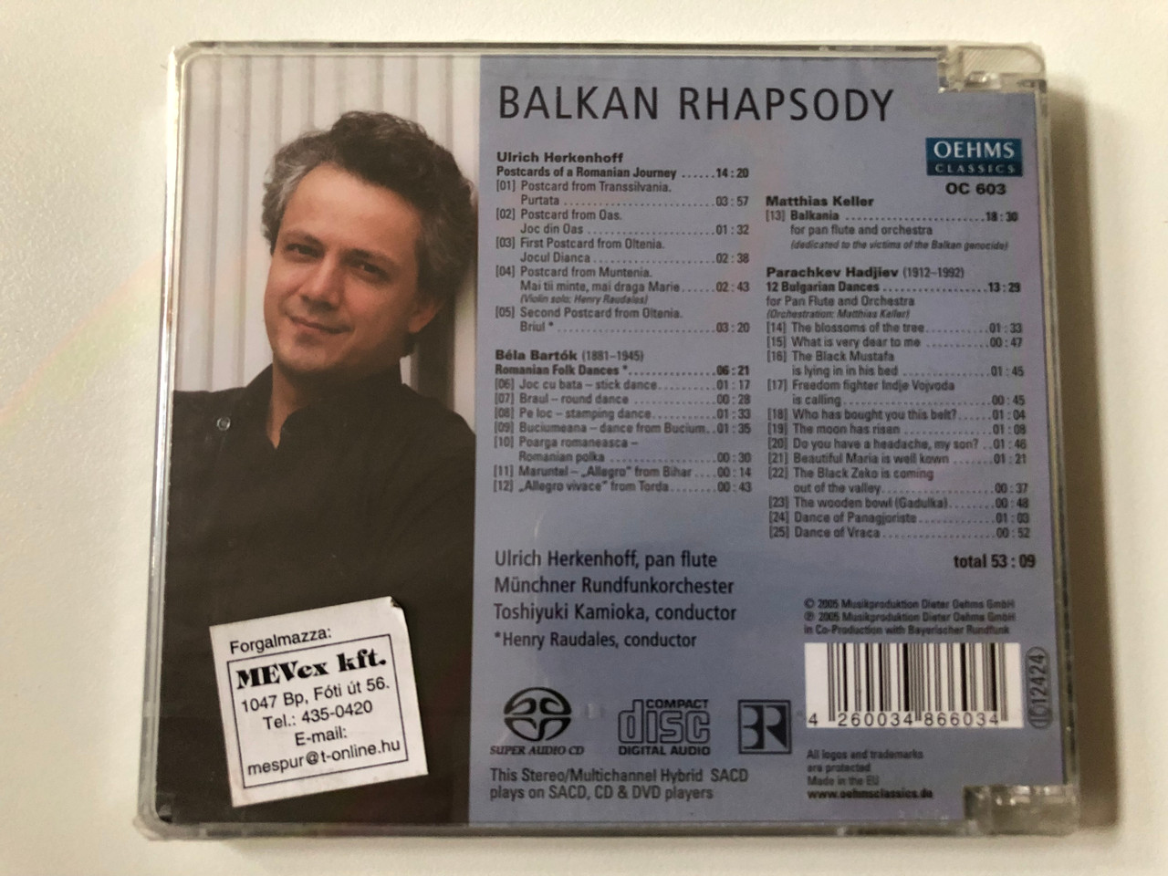 https://cdn10.bigcommerce.com/s-62bdpkt7pb/products/0/images/257531/Balkan_Rhapsody_-_Mnchner_Rundfunkorchester_Kamioka_Raudales_-_Ulrich_Herkenhoff_pan_flute_Bartok_-_Romanian_Folk_Dances_Hadjiev_-_Bulgarian_Folk_Songs_Keller_-_Balkania_Oehms_Classi__48697.1667379834.1280.1280.JPG?c=2&_gl=1*12ug567*_ga*MjA2NTIxMjE2MC4xNTkwNTEyNTMy*_ga_WS2VZYPC6G*MTY2NzM3MTQ0OS42MTMuMS4xNjY3Mzc5Njc3LjUwLjAuMA..