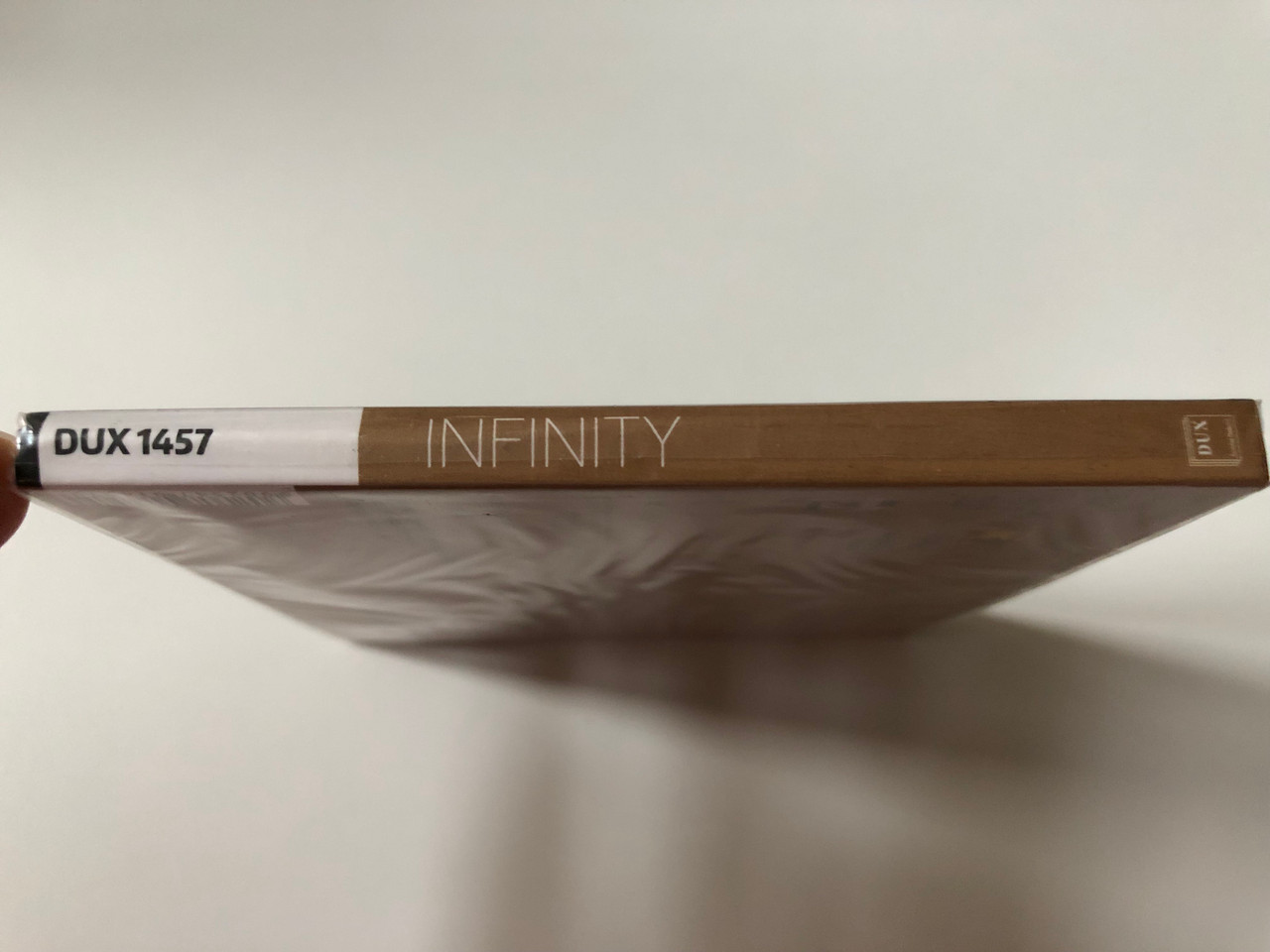 https://cdn10.bigcommerce.com/s-62bdpkt7pb/products/0/images/257602/Infinity_-_Natalia_Jarzbek_flute_Emmy_Wils_piano_DUX_Recording_Producers_Audio_CD_2019_DUX_1457_3__47706.1667463478.1280.1280.JPG?c=2&_gl=1*1mgpmhp*_ga*MjA2NTIxMjE2MC4xNTkwNTEyNTMy*_ga_WS2VZYPC6G*MTY2NzQ1OTcxNy42MTUuMS4xNjY3NDYzNDcyLjYwLjAuMA..