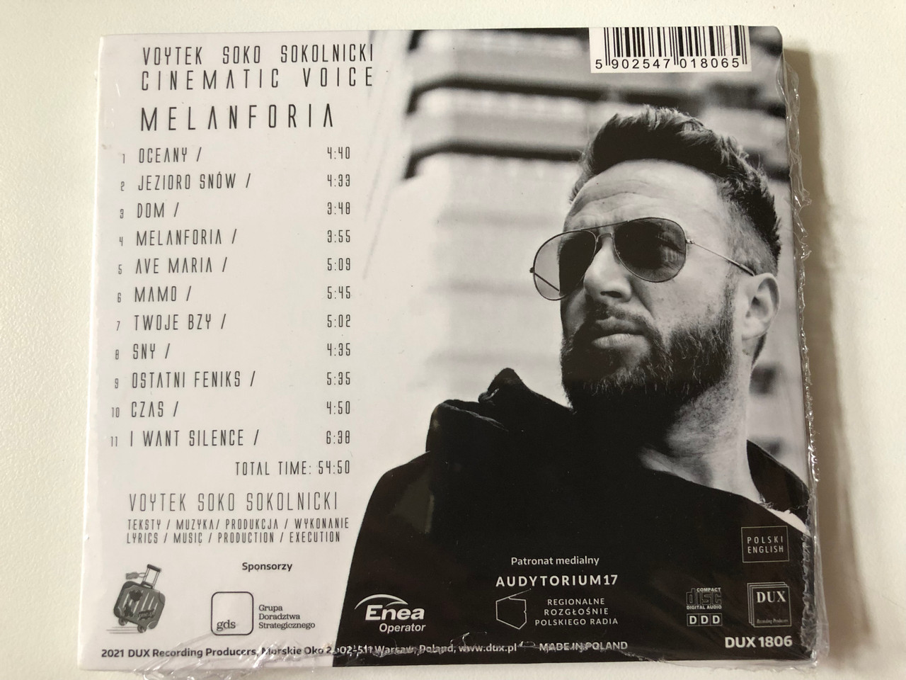 https://cdn10.bigcommerce.com/s-62bdpkt7pb/products/0/images/257604/Voytek_Soko_Sokolnicki_-_Cinematic_Voice_-_Melanforia_DUX_Recording_Producers_Audio_CD_2021_DUX_1457_2__44109.1667463893.1280.1280.JPG?c=2&_gl=1*f1fel5*_ga*MjA2NTIxMjE2MC4xNTkwNTEyNTMy*_ga_WS2VZYPC6G*MTY2NzQ1OTcxNy42MTUuMS4xNjY3NDYzNjA0LjE2LjAuMA..