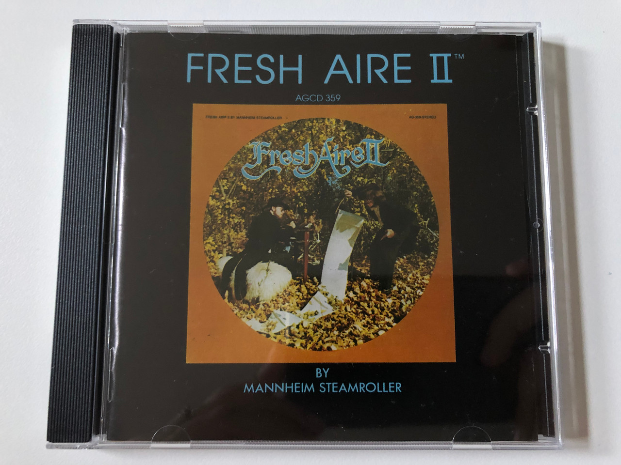 https://cdn10.bigcommerce.com/s-62bdpkt7pb/products/0/images/257670/Fresh_Aire_II_-_By_Mannheim_Steamroller_American_Gramaphone_Records_Audio_CD_1984_AGCD_359_1__94078.1667474540.1280.1280.JPG?c=2&_gl=1*ad2bji*_ga*MjA2NTIxMjE2MC4xNTkwNTEyNTMy*_ga_WS2VZYPC6G*MTY2NzQ1OTcxNy42MTUuMS4xNjY3NDc0NTM4LjYwLjAuMA..