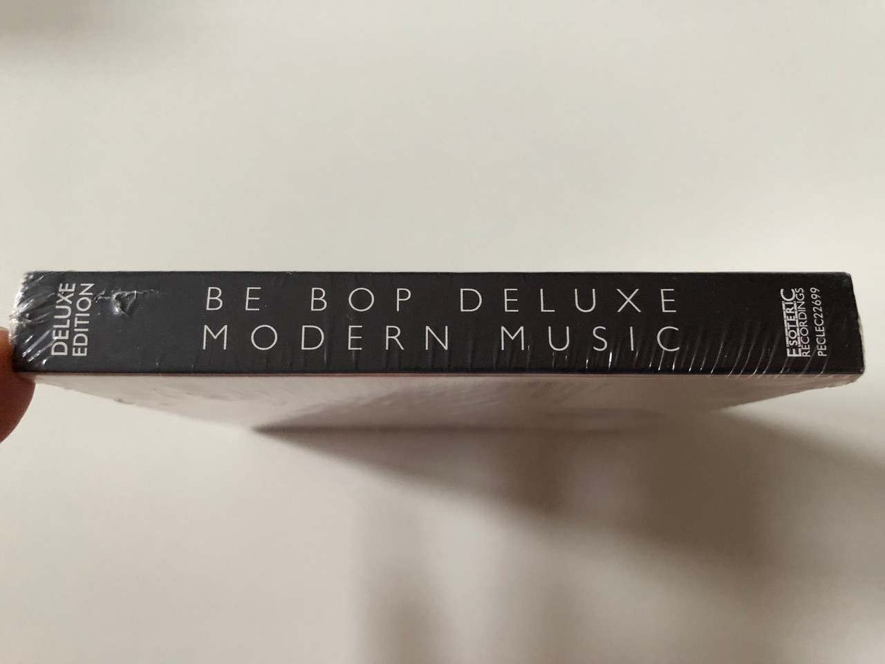https://cdn10.bigcommerce.com/s-62bdpkt7pb/products/0/images/257763/Be_Bop_Deluxe_Modern_Music_A_new_CD_expanded_edition_of_this_classic_album_featuring_the_original_album_newly_remastered_from_the_original_Harvest_master_tapes_Esoteric_Recordings_2x_Aud_3__10765.1667551281.1280.1280.JPG?c=2&_gl=1*1aw9edo*_ga*MjA2NTIxMjE2MC4xNTkwNTEyNTMy*_ga_WS2VZYPC6G*MTY2NzU0NTYyOS42MTcuMS4xNjY3NTUxMjkzLjYwLjAuMA..