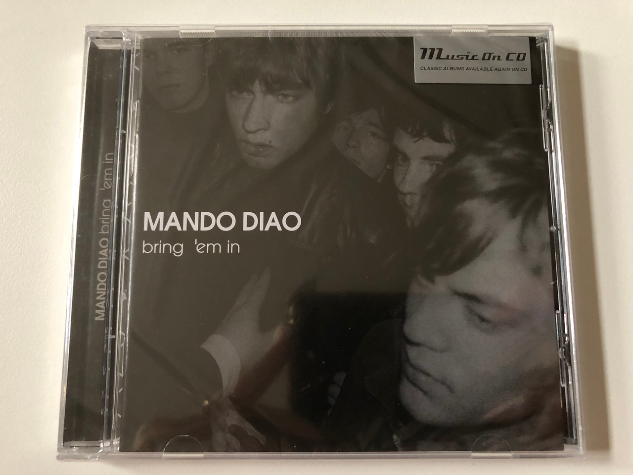 https://cdn10.bigcommerce.com/s-62bdpkt7pb/products/0/images/257775/Mando_Diao_Bring_Em_In_Music_On_CD_Audio_CD_2022_MOCCD14136_1__95359.1667552722.1280.1280.JPG?c=2&_gl=1*1hrxn7n*_ga*MjA2NTIxMjE2MC4xNTkwNTEyNTMy*_ga_WS2VZYPC6G*MTY2NzU0NTYyOS42MTcuMS4xNjY3NTUyNjQ0LjUwLjAuMA..