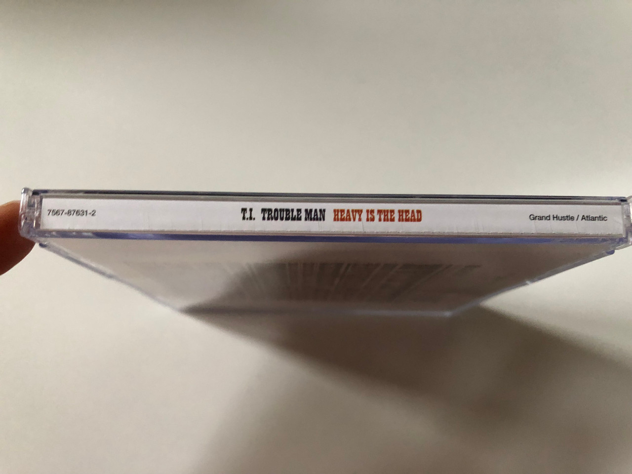 https://cdn10.bigcommerce.com/s-62bdpkt7pb/products/0/images/257954/T.I._Trouble_Man_Heavy_Is_The_Head_Grand_Hustle_Audio_CD_2012_7567-87631-2_3__44216.1667844156.1280.1280.JPG?c=2&_gl=1*9j1ytk*_ga*MjA2NTIxMjE2MC4xNTkwNTEyNTMy*_ga_WS2VZYPC6G*MTY2NzgzMzMyOS42MTkuMS4xNjY3ODQ0MzQ2LjYwLjAuMA..