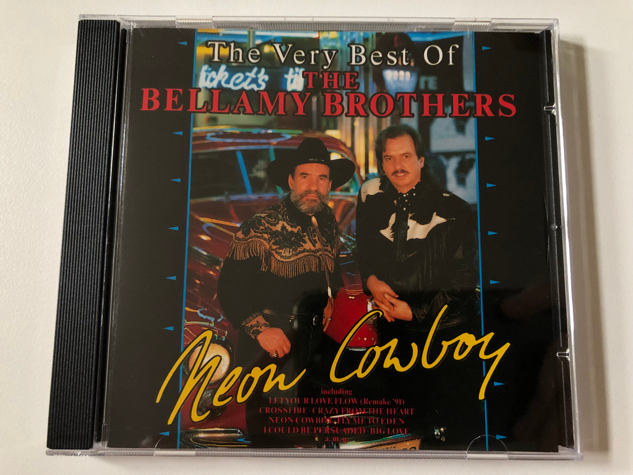 https://cdn10.bigcommerce.com/s-62bdpkt7pb/products/0/images/258010/The_Very_Best_Of_The_Bellamy_Brothers_-_Neon_Cowboy_Including_Letyour_Love_Flow_Remake_91_Crossfire_Crazy_From_The_Heart_Neon_Cowboy_Fly_Me_To_Eden_I_Could_Be_Persuaded_Big_Love_a._1__15891.1667929884.1280.1280.JPG?c=2&_gl=1*zg8e22*_ga*MjA2NTIxMjE2MC4xNTkwNTEyNTMy*_ga_WS2VZYPC6G*MTY2NzkxNzY2My42MjAuMS4xNjY3OTI5MTgzLjM0LjAuMA..