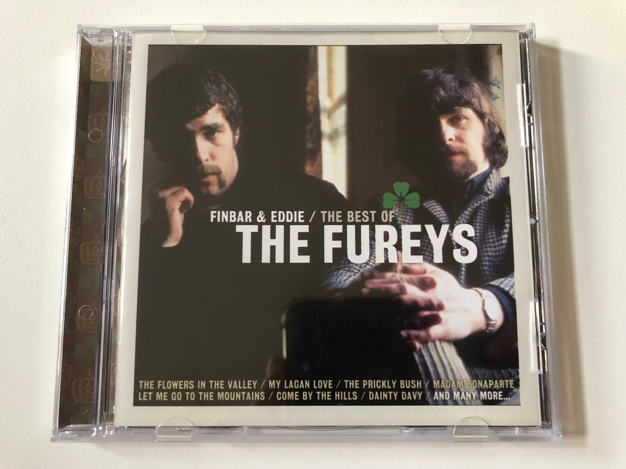 https://cdn10.bigcommerce.com/s-62bdpkt7pb/products/0/images/258603/Finbar_Eddie_Furey_The_Best_Of_The_Fureys_The_Flowers_In_The_Valley_My_Lagan_Love_The_Prickly_Bush_Madam_Bonaparte_Let_Me_Go_To_The_Mountains_Come_By_The_Hills_Dainty_Davy_and_man_1__62145.1668410055.1280.1280.JPG?c=2&_gl=1*1112vux*_ga*MjA2NTIxMjE2MC4xNTkwNTEyNTMy*_ga_WS2VZYPC6G*MTY2ODQwNzg4NC42MjcuMS4xNjY4NDEwMDMxLjYwLjAuMA..
