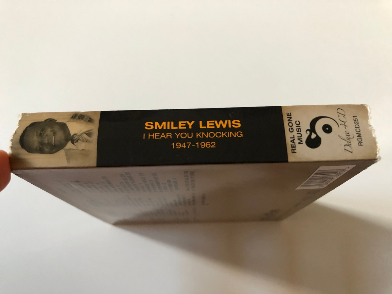https://cdn10.bigcommerce.com/s-62bdpkt7pb/products/0/images/258768/Smiley_Lewis_I_Hear_You_Knocking_1947_-_1962_Digitally_Remastered_And_Enhanced_For_Superior_Quality_Real_Gone_4x_Audio_CD_RGMCD251_4__61607.1668495864.1280.1280.JPG?c=2&_gl=1*1fpz6fl*_ga*MjA2NTIxMjE2MC4xNTkwNTEyNTMy*_ga_WS2VZYPC6G*MTY2ODQ4OTYyMy42MjguMS4xNjY4NDk1NzQwLjUxLjAuMA..