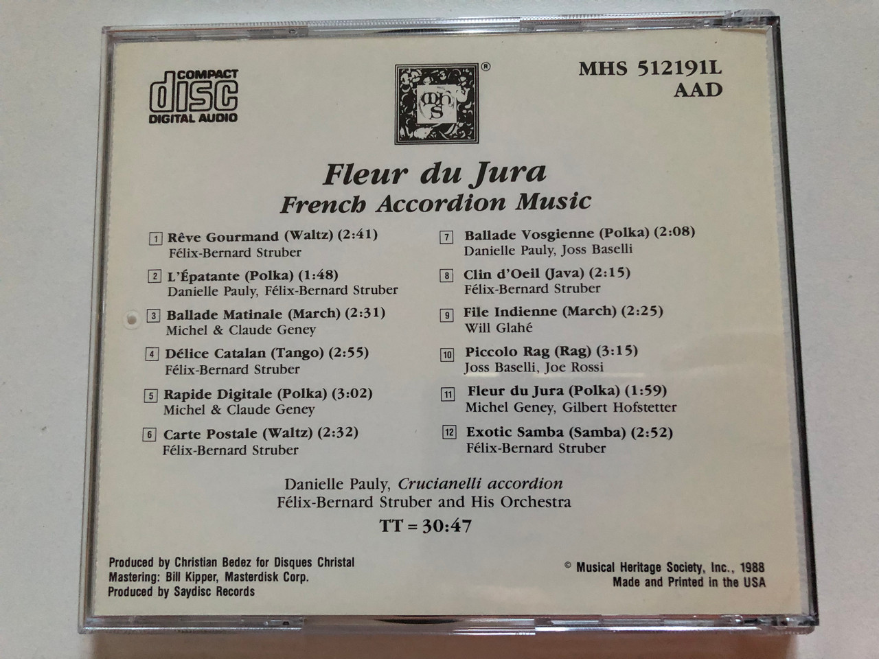 https://cdn10.bigcommerce.com/s-62bdpkt7pb/products/0/images/259207/Fleur_Du_Jura_French_Accordion_Music_-_Danielle_Pauly_accordion_Flix-Bernard_Struber_And_His_Orchestra_Musical_Heritage_Society_Audio_CD_1988_MHS_512191L_4__77183.1669118457.1280.1280.JPG?c=2&_gl=1*9b7rcu*_ga*MjA2NTIxMjE2MC4xNTkwNTEyNTMy*_ga_WS2VZYPC6G*MTY2OTEwODAwNS42MzcuMS4xNjY5MTE4MzkzLjYwLjAuMA..