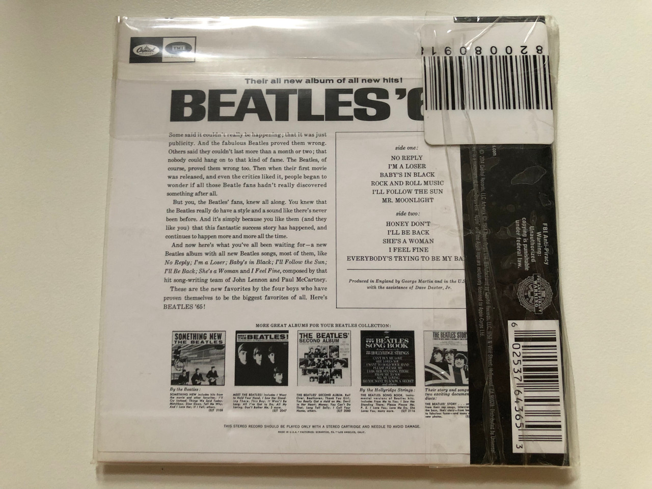 https://cdn10.bigcommerce.com/s-62bdpkt7pb/products/0/images/259340/The_Beatles_Beatles_65_Great_New_Hits_By_John_Paul_George_Ringo_Shes_A_Woman_No_Reply_Im_A_Loser_Rock_And_Roll_Music_Ill_Follow_The_Sun_Ill_Be_Back_Babys_In_Black_Capito__89636.1669199957.1280.1280.JPG?c=2&_gl=1*18u61b9*_ga*MjA2NTIxMjE2MC4xNTkwNTEyNTMy*_ga_WS2VZYPC6G*MTY2OTE4OTY1NS42MzkuMS4xNjY5MTk5NTE5LjU3LjAuMA..