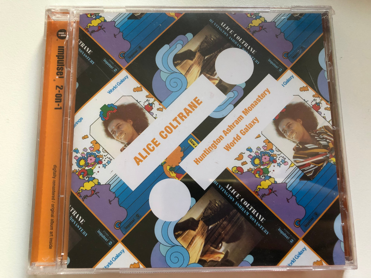 https://cdn10.bigcommerce.com/s-62bdpkt7pb/products/0/images/259444/Alice_Coltrane_Huntington_Ashram_Monastery_World_Galaxy_Impulse_2-On-1_Impulse_Audio_CD_2011_06025_2780946_1__01103.1669305853.1280.1280.JPG?c=2&_gl=1*ki8squ*_ga*MjA2NTIxMjE2MC4xNTkwNTEyNTMy*_ga_WS2VZYPC6G*MTY2OTMwMjg0NC42NDMuMS4xNjY5MzA1NjIyLjU1LjAuMA..