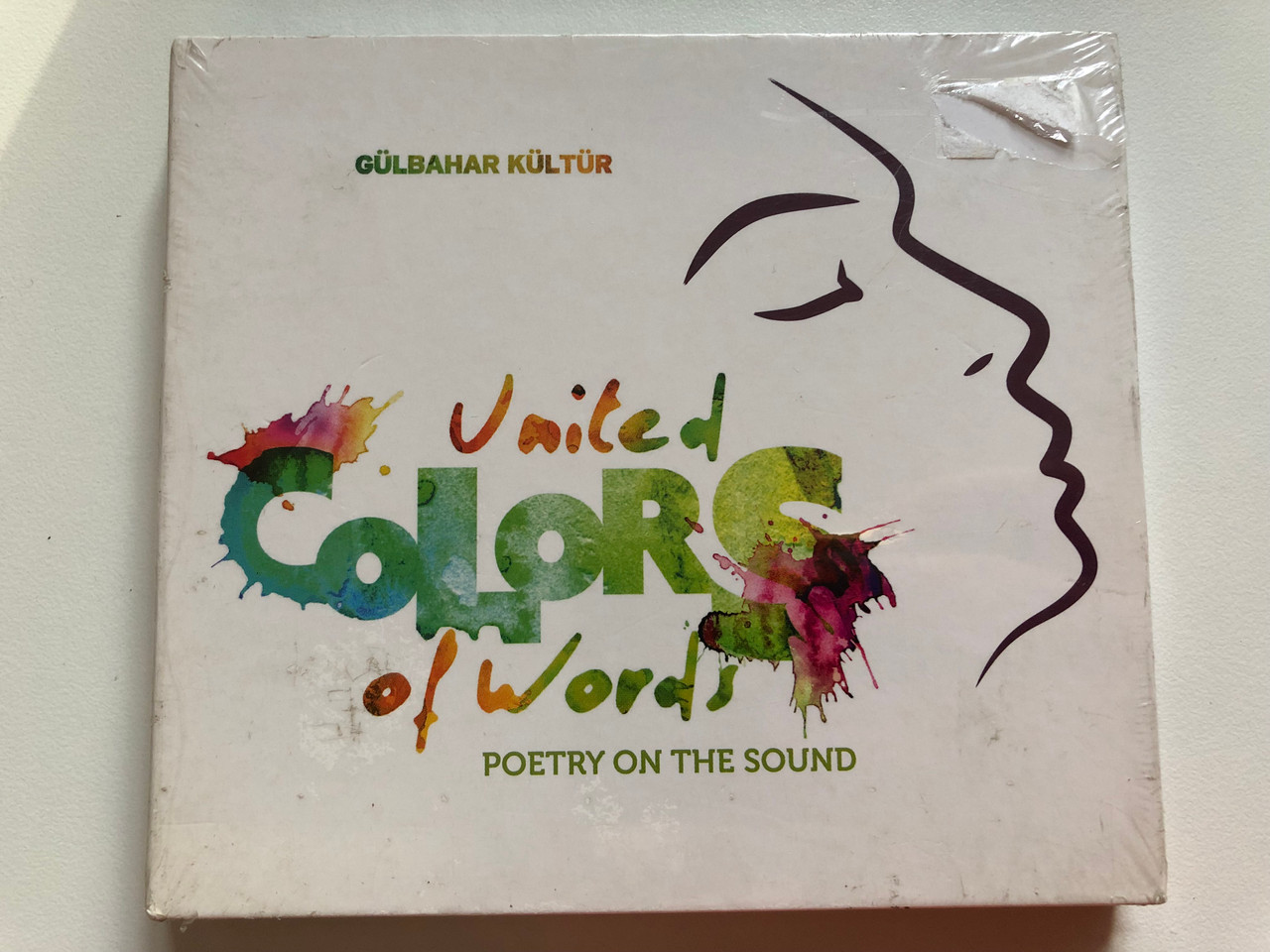 https://cdn10.bigcommerce.com/s-62bdpkt7pb/products/0/images/259465/Glbahar_Kltr_United_Colors_Of_Words_-_Poetry_On_The_Sound_Lolas_World_2x_Audio_CD_CLS0002702_1__34618.1669367369.1280.1280.JPG?c=2&_gl=1*dq2enj*_ga*MjA2NTIxMjE2MC4xNTkwNTEyNTMy*_ga_WS2VZYPC6G*MTY2OTM2NDA1Ny42NDQuMS4xNjY5MzY3MzgwLjYwLjAuMA..