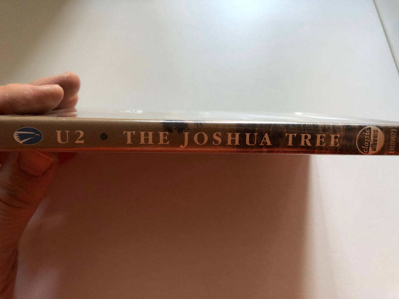 https://cdn10.bigcommerce.com/s-62bdpkt7pb/products/0/images/259520/U2_The_Joshua_Tree_Classic_Albums_Featuring_cuts_from_Where_The_Streets_Have_No_Name_With_Or_Without_You_I_Still_Havent_Found_What_Im_Looking_For_Bullet_The_Blue_Sky_Eagle_Rock_Ent_3__76347.1669378946.1280.1280.JPG?c=2&_gl=1*189r50b*_ga*MjA2NTIxMjE2MC4xNTkwNTEyNTMy*_ga_WS2VZYPC6G*MTY2OTM3MzQ2NS42NDUuMS4xNjY5Mzc4NzgxLjQ1LjAuMA..