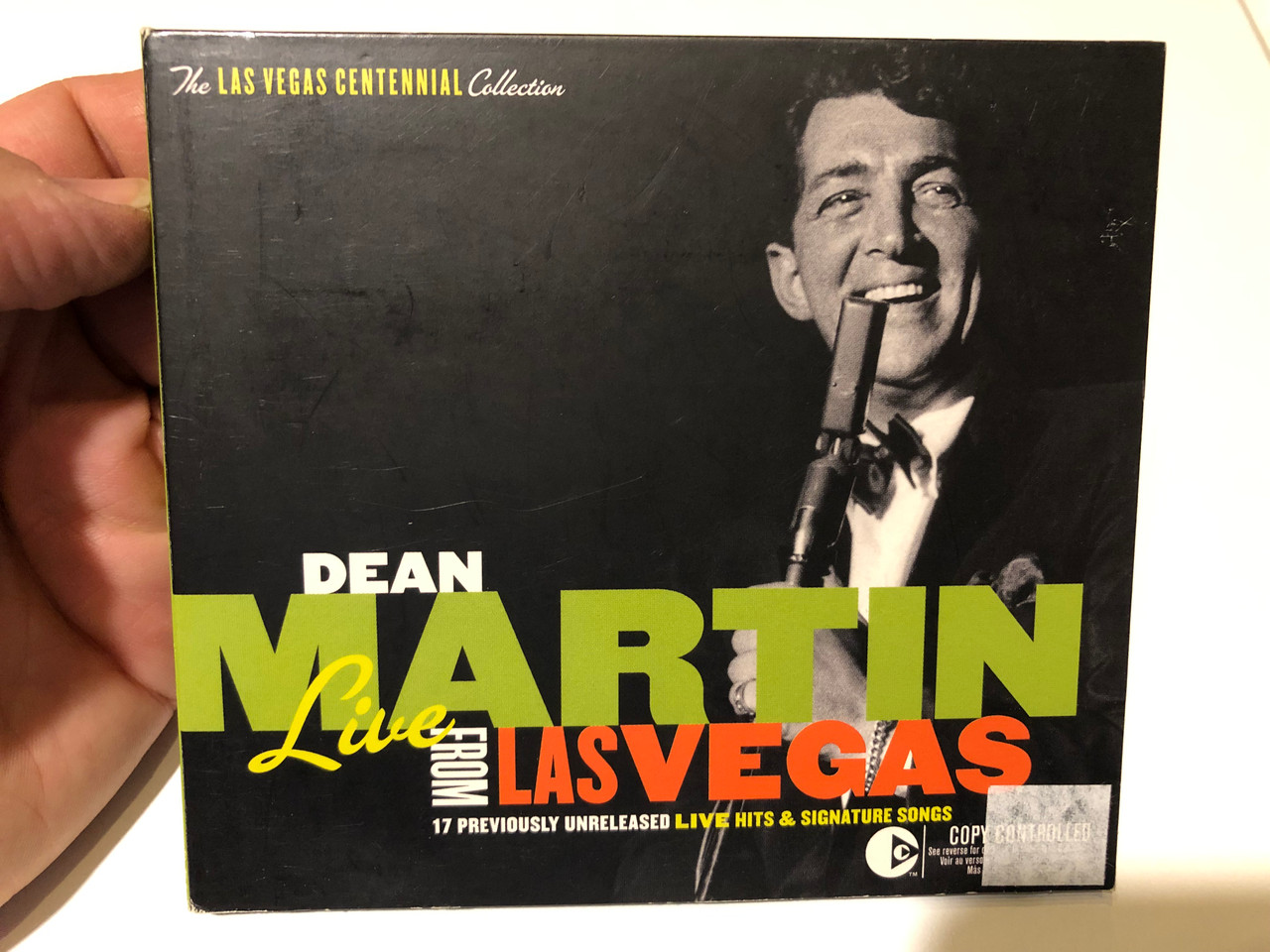 https://cdn10.bigcommerce.com/s-62bdpkt7pb/products/0/images/259751/Dean_Martin_Live_From_Las_Vegas_17_Previously_Unreleased_Live_Hits_Signature_Songs_The_Las_Vegas_Centennial_Collection_Capitol_Records_Audio_CD_2005_72435-60394-2-1_1__48509.1669797965.1280.1280.JPG?c=2&_gl=1*1seifoq*_ga*MjA2NTIxMjE2MC4xNTkwNTEyNTMy*_ga_WS2VZYPC6G*MTY2OTc4ODU4MS42NTEuMS4xNjY5Nzk3ODQ2LjYwLjAuMA..