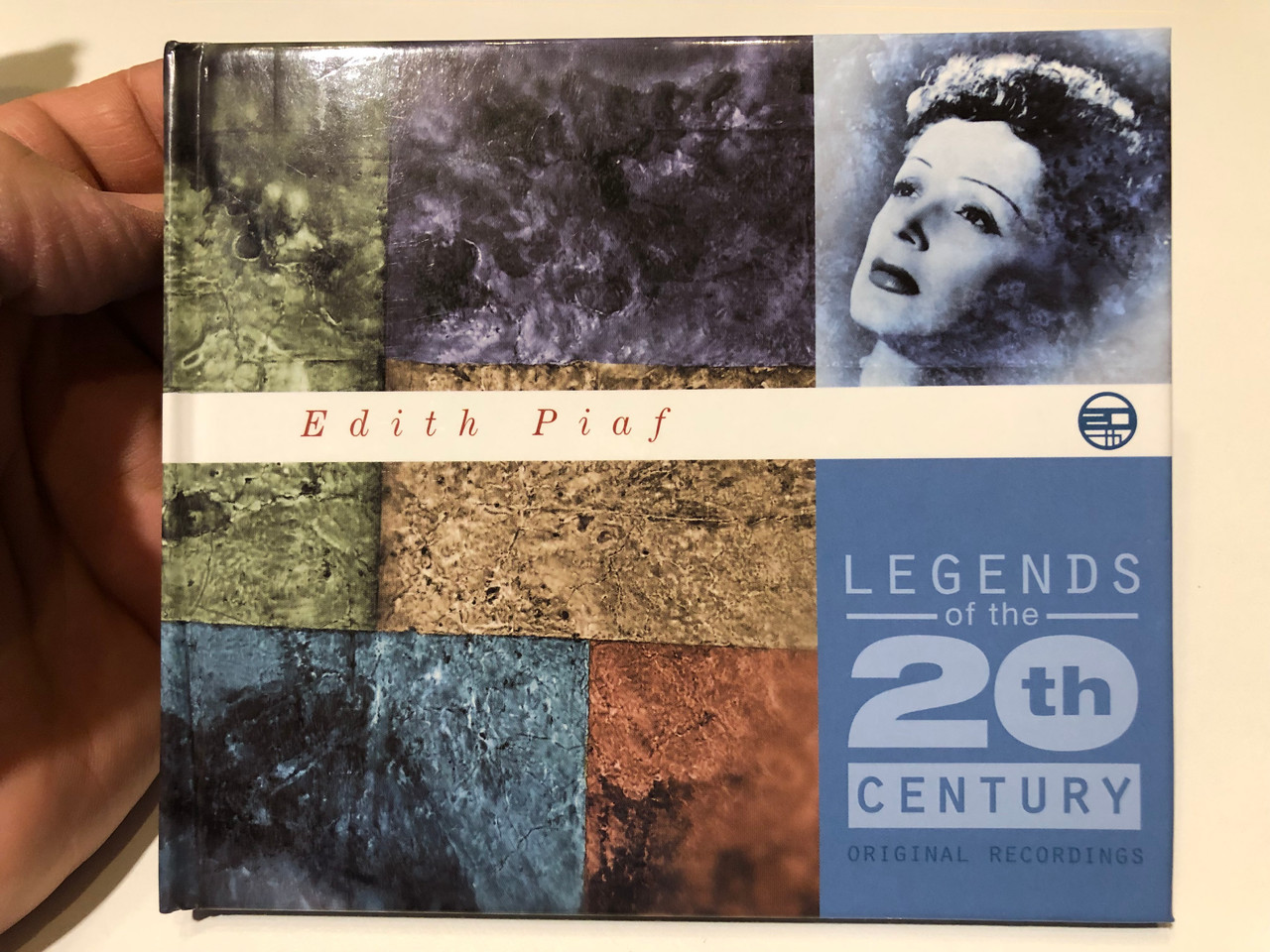 https://cdn10.bigcommerce.com/s-62bdpkt7pb/products/0/images/259793/Edith_Piaf_-_Legends_Of_The_20th_Century_Original_Recordings_EMI_Audio_CD_1999_724352014224_1__89824.1669811426.1280.1280.JPG?c=2&_gl=1*5d8mqq*_ga*MjA2NTIxMjE2MC4xNTkwNTEyNTMy*_ga_WS2VZYPC6G*MTY2OTgwNzY3Mi42NTIuMS4xNjY5ODExMjk4LjQzLjAuMA..