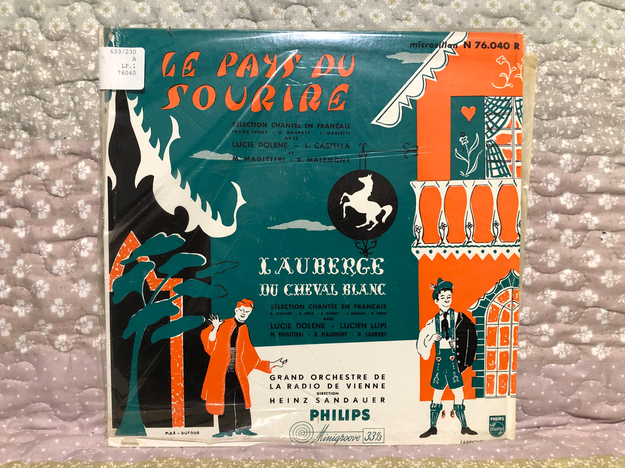 https://cdn10.bigcommerce.com/s-62bdpkt7pb/products/0/images/260011/Le_Pays_Du_Sourire_-_Lucie_Dolne_Louis_C._et_M._Magitteri_R._Malemont_LAuberge_Du_Cheval_Blanc_-_Lucie_Dolene_Lucien_Lupi_M._Magiterri_R._Malemont_P._Laurent_Philips_LP_N_76.040_R_1__10071.1670262405.1280.1280.JPG?c=2&_gl=1*13sv2sa*_ga*MjA2NTIxMjE2MC4xNTkwNTEyNTMy*_ga_WS2VZYPC6G*MTY3MDI1Mzg3Ny42NTcuMS4xNjcwMjYyNDE3LjYwLjAuMA..