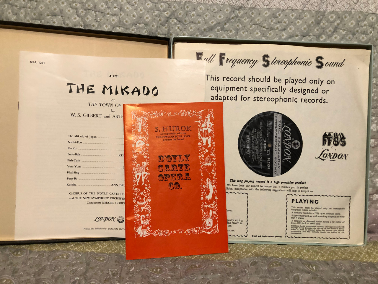 https://cdn10.bigcommerce.com/s-62bdpkt7pb/products/0/images/260238/Gilbert_And_Sullivan_-_The_Mikado_-_DOyly_Carte_Opera_Company_with_The_New_Symphony_Orchestra_Of_London_Conducted_By_Isidore_Godfrey_London_Records_2x_LP_OSA-1201_2__91154.1670520816.1280.1280.JPG?c=2&_gl=1*1x4x9f6*_ga*MjA2NTIxMjE2MC4xNTkwNTEyNTMy*_ga_WS2VZYPC6G*MTY3MDUxMTg2My42NjEuMS4xNjcwNTIwNzYwLjYwLjAuMA..