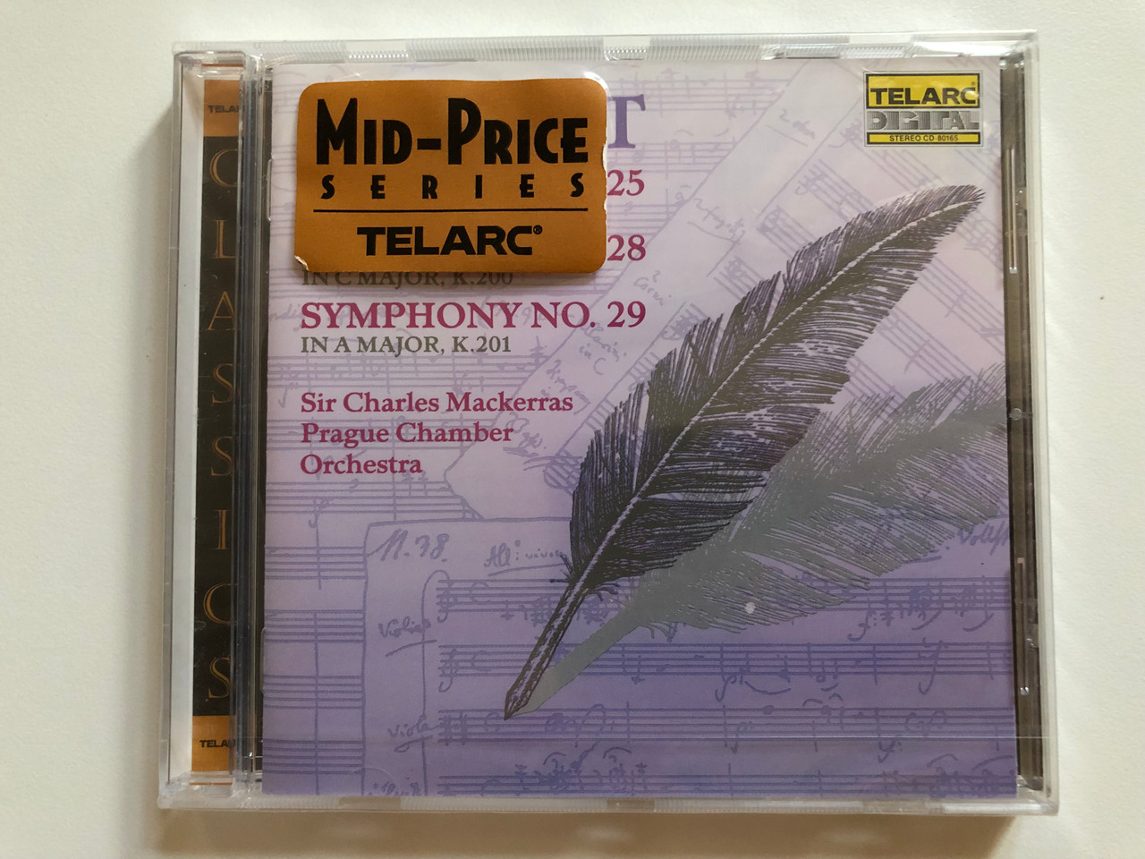 https://cdn10.bigcommerce.com/s-62bdpkt7pb/products/0/images/260697/Mozart_-_Symphony_No._25_In_G_Minor_K.183_Symphony_No._28_In_C_Major_K.200_Symphony_No._29_In_A_Major_K.201_-_Sir_Charles_Mackerras_Prague_Chamber_Orchestra_Telarc_Audio_CD_1988_1__40382.1670853950.1280.1280.JPG?c=2&_gl=1*1eetor0*_ga*MjA2NTIxMjE2MC4xNTkwNTEyNTMy*_ga_WS2VZYPC6G*MTY3MDg0NzU2MS42NjYuMS4xNjcwODUzNzk0LjQ5LjAuMA..