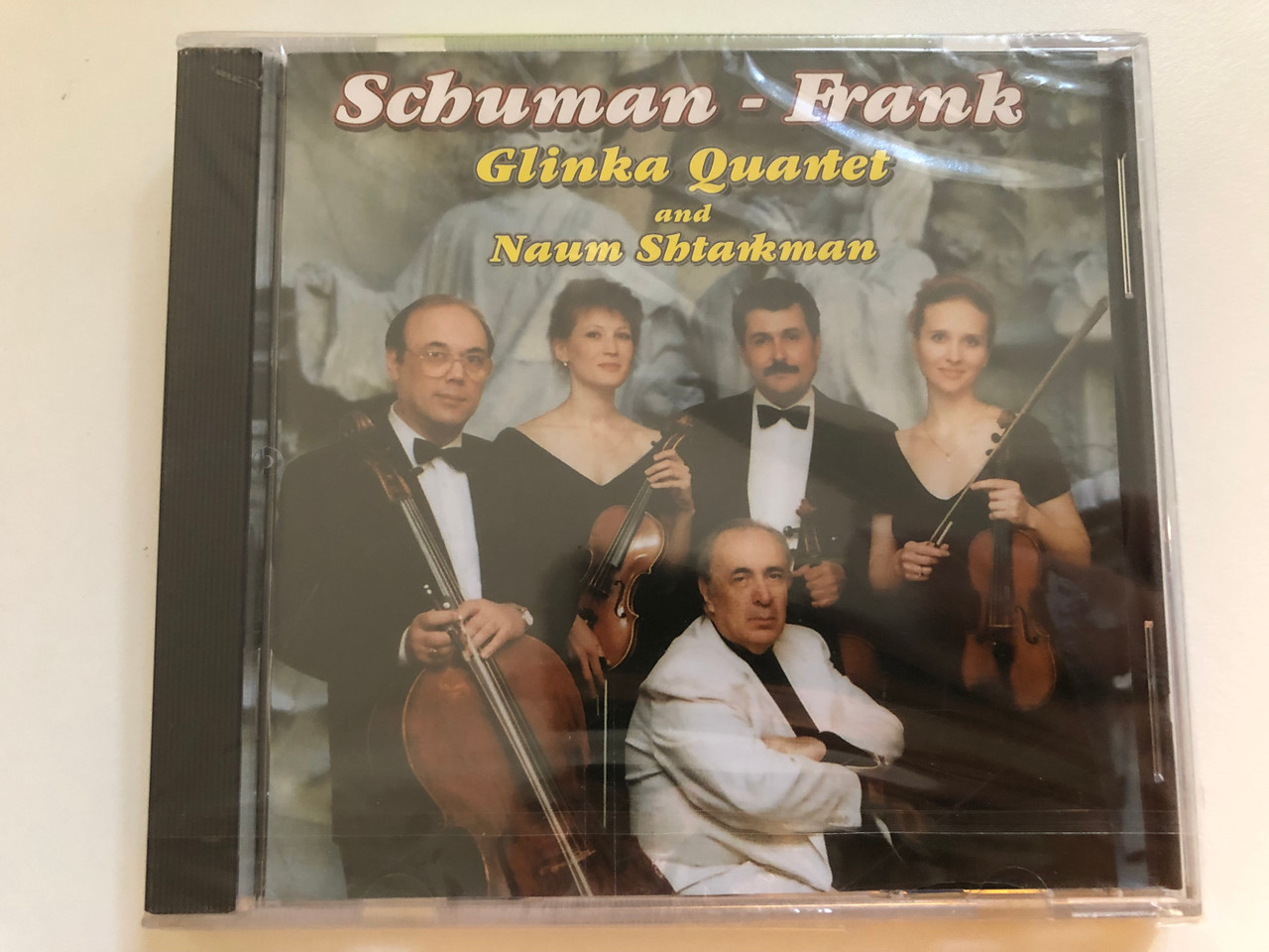 https://cdn10.bigcommerce.com/s-62bdpkt7pb/products/0/images/260886/Schumann_-_Erank_-_Glinka_Quartet_and_Naum_Shtarkman_Audio_CD_1999_1__59226.1671002150.1280.1280.JPG?c=2&_gl=1*1auzppl*_ga*MjA2NTIxMjE2MC4xNTkwNTEyNTMy*_ga_WS2VZYPC6G*MTY3MTAwMDI1NS42NjkuMS4xNjcxMDAxOTU0LjI0LjAuMA..