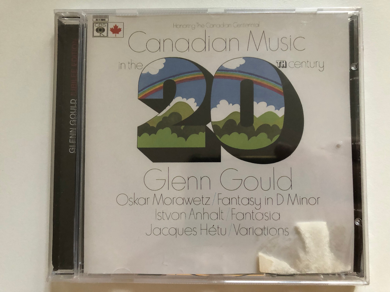 https://cdn10.bigcommerce.com/s-62bdpkt7pb/products/0/images/260956/Canadian_Music_in_the_20th_century_-_Glenn_Gould_Oskar_Morawetz_-_Fantasy_in_D_Minor_Istvan_Anhalt_-_Fantasia_Jacques_Hetu_-_Variations_Sony_BMG_Music_Audio_CD_2007_88697148032_1__05597.1671028110.1280.1280.JPG?c=2&_gl=1*w6c4tk*_ga*MjA2NTIxMjE2MC4xNTkwNTEyNTMy*_ga_WS2VZYPC6G*MTY3MTAyNDU3Ni42NzEuMS4xNjcxMDI4MDY3LjYwLjAuMA..